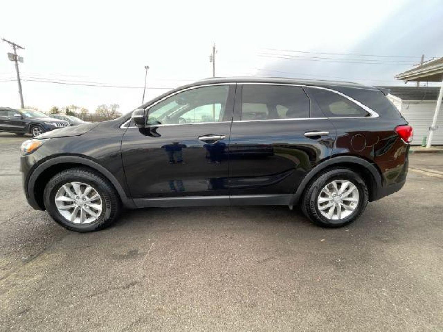 2016 Ebony Black Kia Sorento LX 2WD (5XYPG4A34GG) with an 2.4L L4 DOHC 16V engine, 6-Speed Automatic transmission, located at 880 E. National Road, Vandalia, OH, 45377, (937) 908-9800, 39.891918, -84.183594 - Photo#3