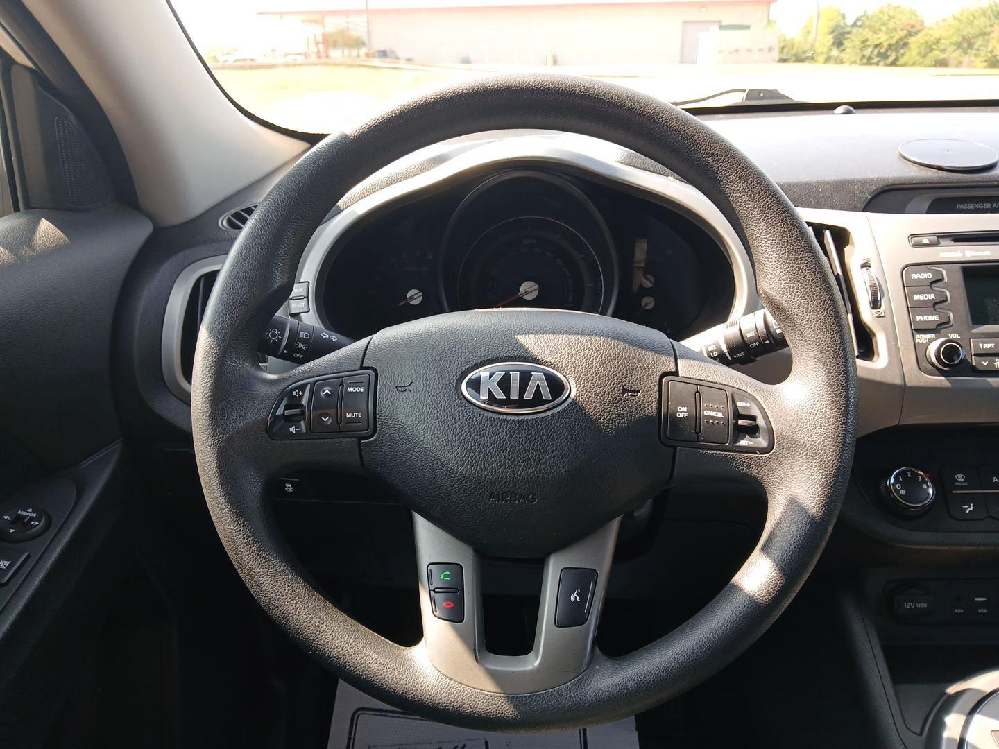 2016 Kia Sportage LX FWD (KNDPB3AC7G7) with an 2.4L V6 DOHC 24V engine, 6-Speed Automatic transmission, located at 1099 N County Rd 25A , Troy, OH, 45373, (937) 908-9800, 40.057079, -84.212883 - 2016 Kia Sportage LX FWD - Photo#15