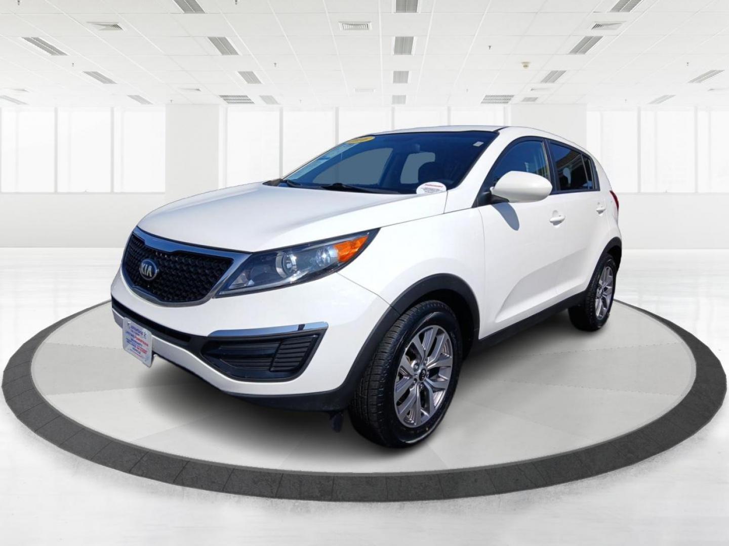 2016 Kia Sportage LX FWD (KNDPB3AC7G7) with an 2.4L V6 DOHC 24V engine, 6-Speed Automatic transmission, located at 1099 N County Rd 25A , Troy, OH, 45373, (937) 908-9800, 40.057079, -84.212883 - 2016 Kia Sportage LX FWD - Photo#7