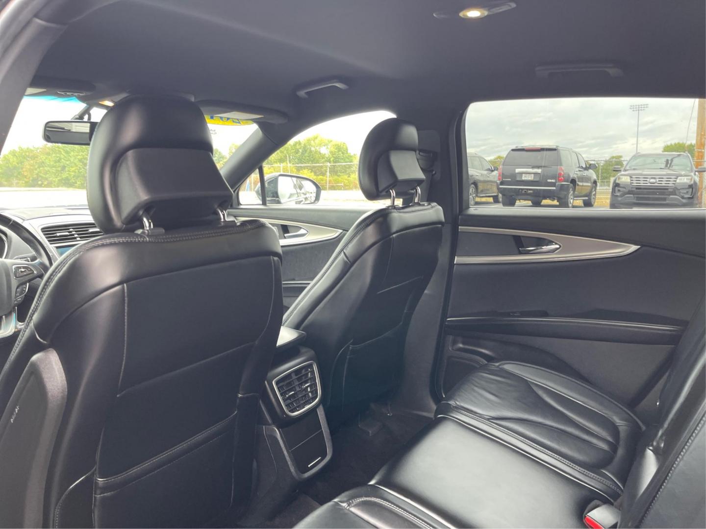 2016 Black Velvet Metallic Lincoln MKX Select AWD (2LMTJ8KR7GB) with an 3.7L V6 DOHC 24V engine, 6A transmission, located at 1099 N County Rd 25A , Troy, OH, 45373, (937) 908-9800, 40.057079, -84.212883 - Photo#9