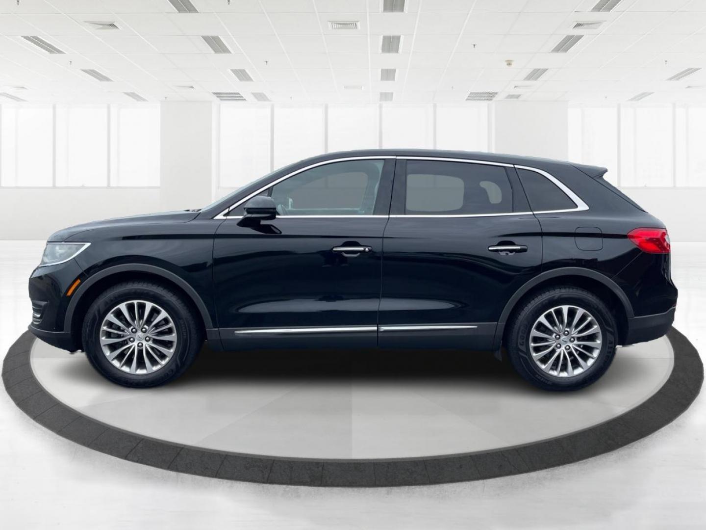 2016 Black Velvet Metallic Lincoln MKX Select AWD (2LMTJ8KR7GB) with an 3.7L V6 DOHC 24V engine, 6A transmission, located at 1099 N County Rd 25A , Troy, OH, 45373, (937) 908-9800, 40.057079, -84.212883 - Photo#5