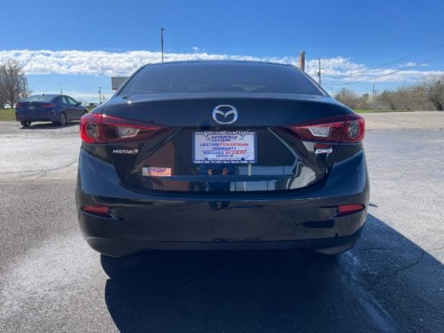 2016 Jet Black Mica Mazda MAZDA3 i Sport AT 4-Door (JM1BM1U73G1) with an 2.0L L4 DOHC 16V engine, 6-Speed Automatic transmission, located at 4508 South Dixie Dr, Moraine, OH, 45439, (937) 908-9800, 39.689976, -84.218452 - Photo#4