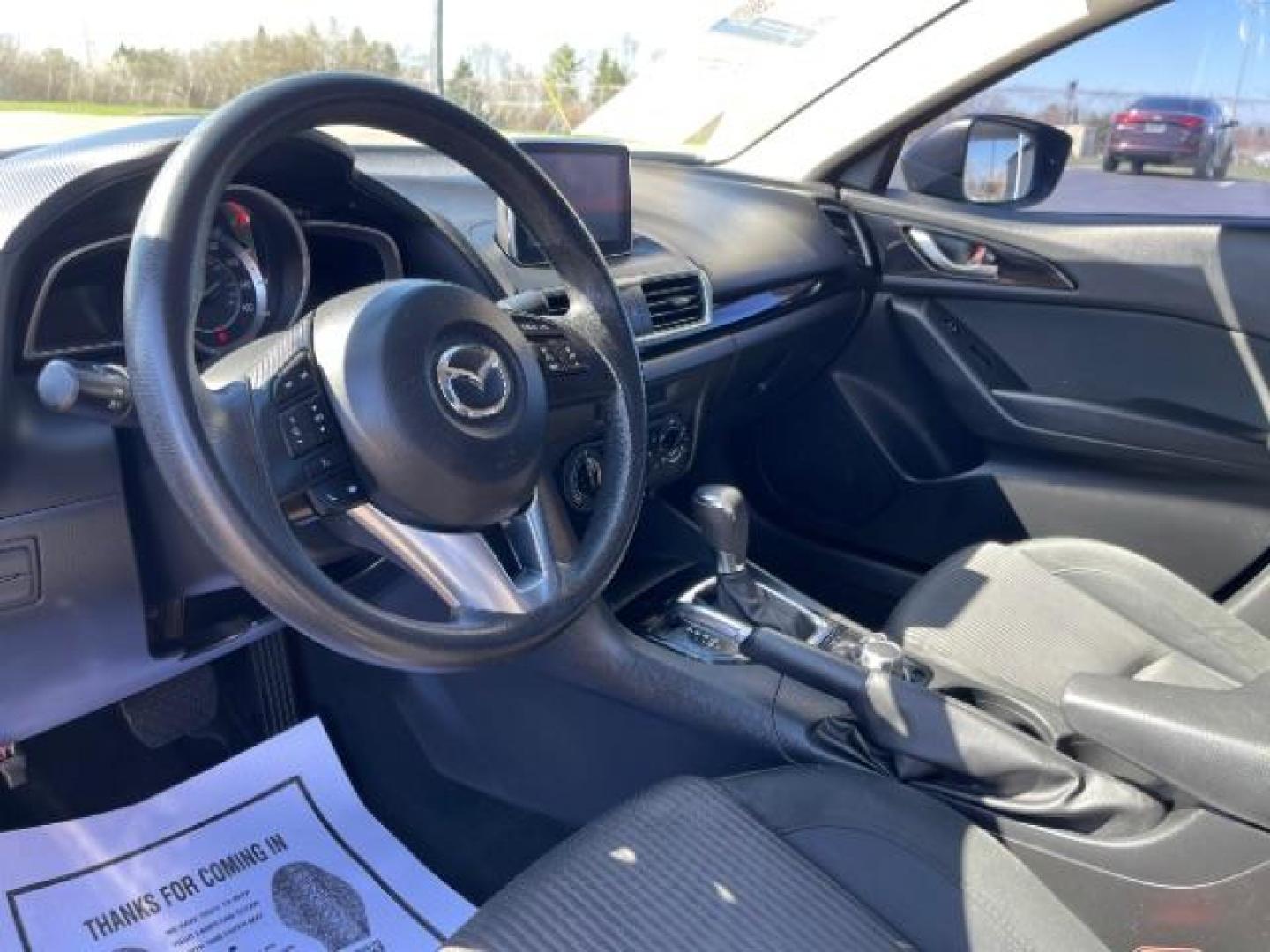 2016 Jet Black Mica Mazda MAZDA3 i Sport AT 4-Door (JM1BM1U73G1) with an 2.0L L4 DOHC 16V engine, 6-Speed Automatic transmission, located at 4508 South Dixie Dr, Moraine, OH, 45439, (937) 908-9800, 39.689976, -84.218452 - Photo#5