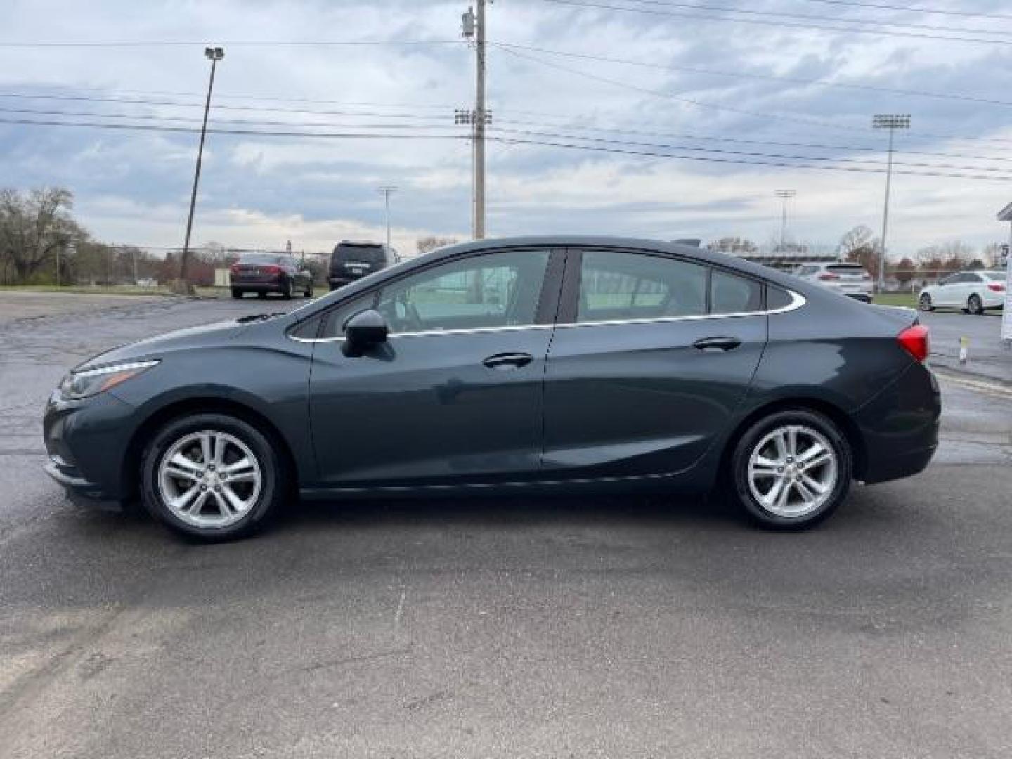 2017 Tungsten Metallic Chevrolet Cruze LT Auto (1G1BE5SM0H7) with an 1.4L L4 DOHC 16V TURBO engine, 6-Speed Automatic transmission, located at 1951 S Dayton Lakeview Rd., New Carlisle, OH, 45344, (937) 908-9800, 39.890999, -84.050255 - Photo#2