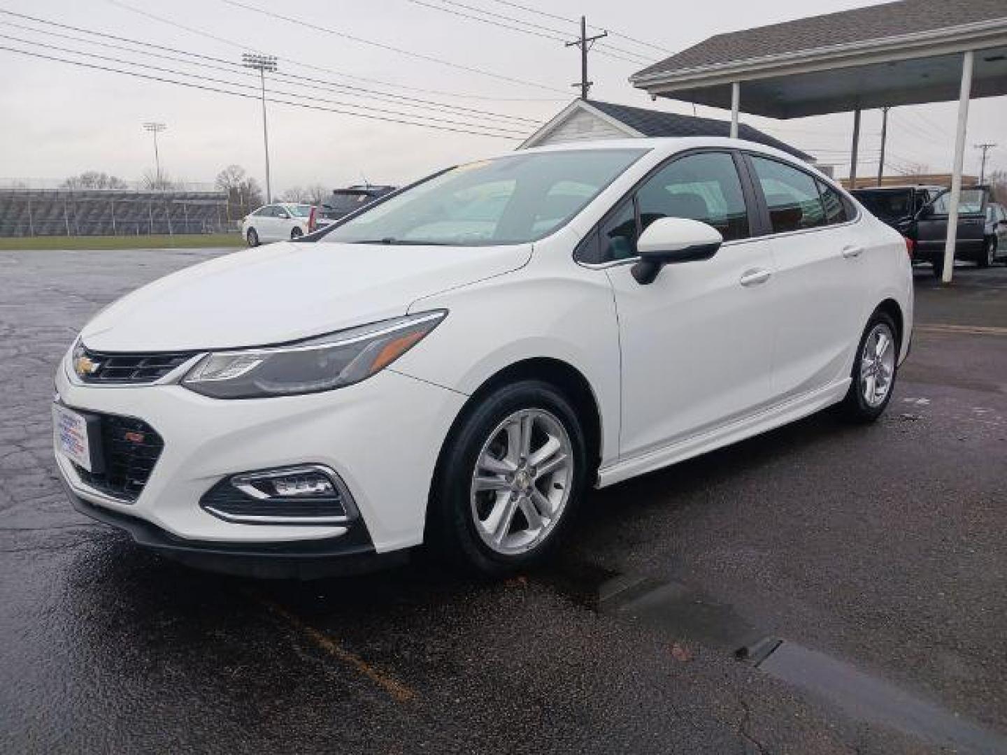 2017 Summit White Chevrolet Cruze LT Auto (1G1BE5SM9H7) with an 1.4L L4 DOHC 16V TURBO engine, 6-Speed Automatic transmission, located at 1951 S Dayton Lakeview Rd., New Carlisle, OH, 45344, (937) 908-9800, 39.890999, -84.050255 - Photo#2