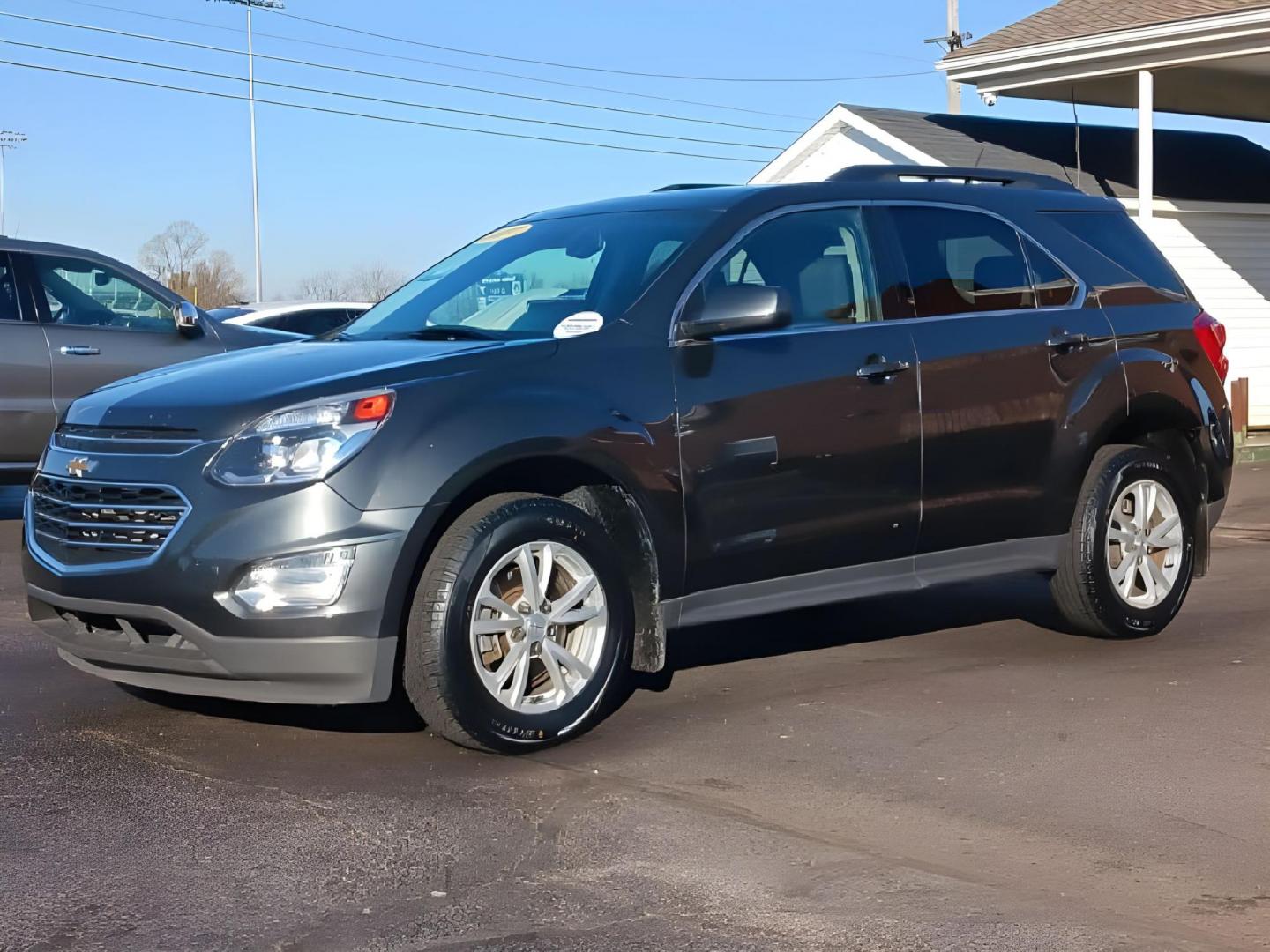 2017 Patriot Blue Metallic Chevrolet Equinox LT AWD (2GNFLFEK9H6) with an 2.4L L4 DOHC 16V FFV engine, 6A transmission, located at 1099 N County Rd 25A , Troy, OH, 45373, (937) 908-9800, 40.057079, -84.212883 - Photo#4