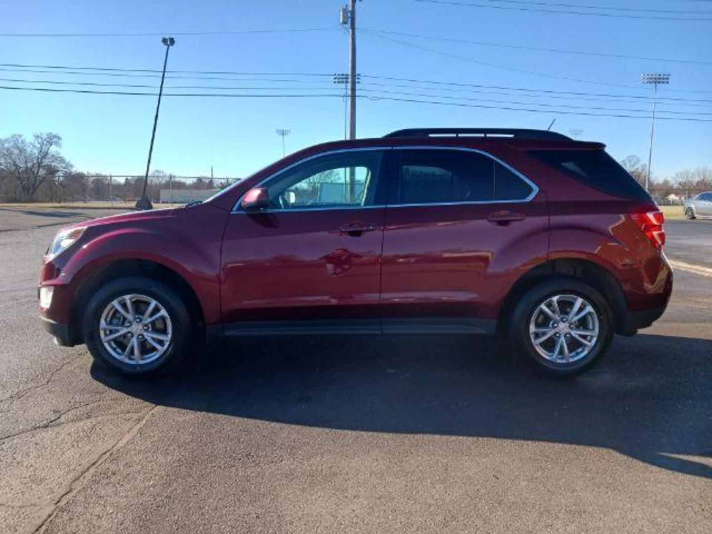 2017 Siren Red Tintcoat Chevrolet Equinox LT AWD (2GNFLFEKXH6) with an 2.4L L4 DOHC 16V FFV engine, 6-Speed Automatic transmission, located at 4508 South Dixie Dr, Moraine, OH, 45439, (937) 908-9800, 39.689976, -84.218452 - Photo#3