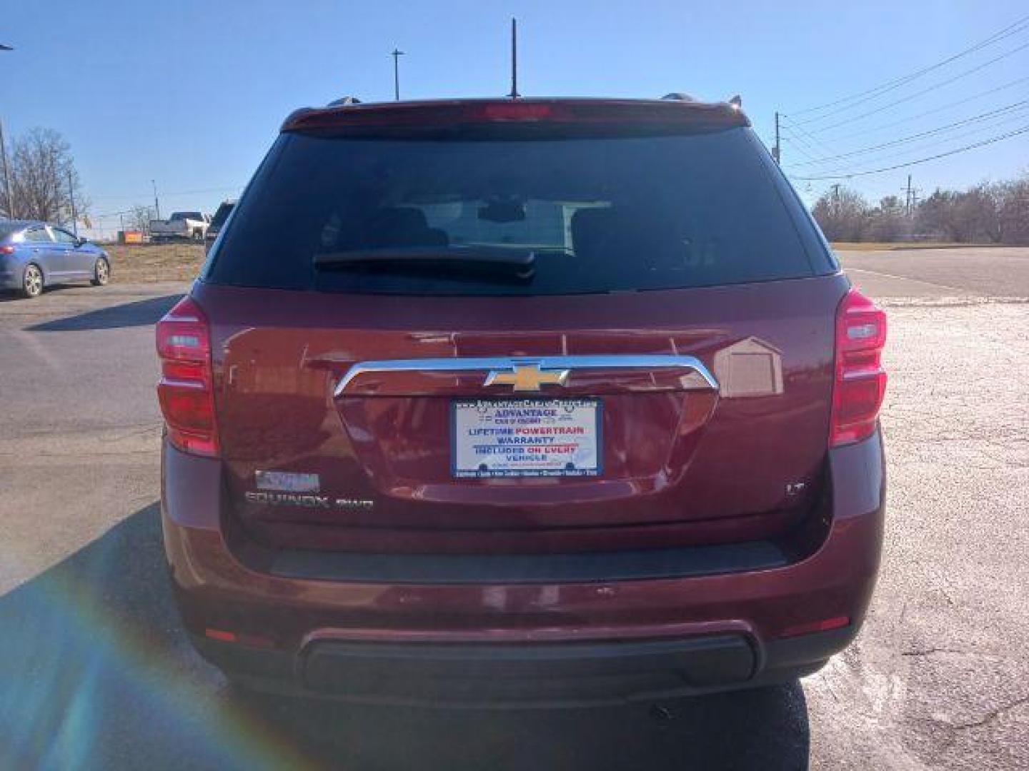 2017 Siren Red Tintcoat Chevrolet Equinox LT AWD (2GNFLFEKXH6) with an 2.4L L4 DOHC 16V FFV engine, 6-Speed Automatic transmission, located at 4508 South Dixie Dr, Moraine, OH, 45439, (937) 908-9800, 39.689976, -84.218452 - Photo#5