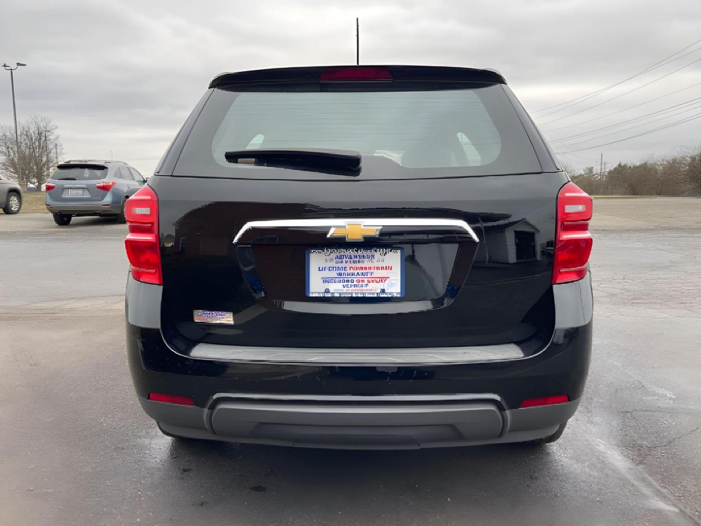 2017 Black Chevrolet Equinox LS 2WD (2GNALBEK2H1) with an 2.4L L4 DOHC 16V FFV engine, 6-Speed Automatic transmission, located at 401 Woodman Dr, Riverside, OH, 45431, (937) 908-9800, 39.760899, -84.123421 - Photo#4