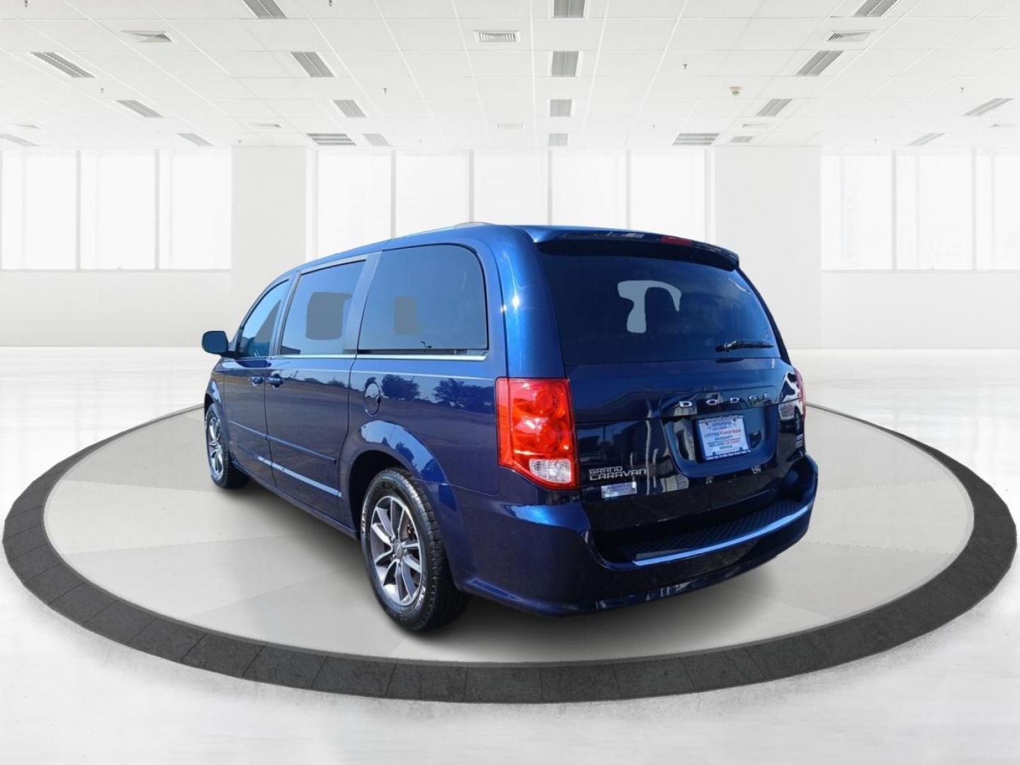 2017 Contusion Blue Pearl Coat Dodge Grand Caravan SXT (2C4RDGCG0HR) with an 3.6L V6 DOHC 24V engine, 6A transmission, located at 1099 N County Rd 25A , Troy, OH, 45373, (937) 908-9800, 40.057079, -84.212883 - Photo#4