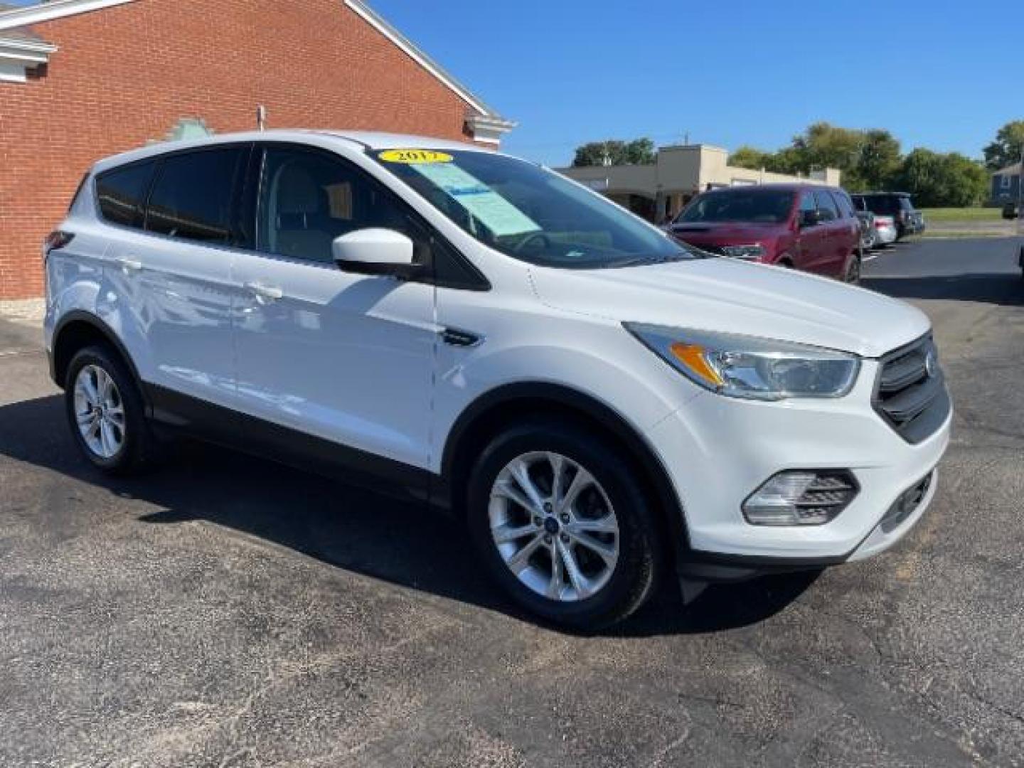 2017 White Platinum Tri-Coat Metallic Ford Escape SE FWD (1FMCU0GD1HU) with an 1.5L L4 DOHC 16V engine, 6-Speed Automatic transmission, located at 4508 South Dixie Dr, Moraine, OH, 45439, (937) 908-9800, 39.689976, -84.218452 - Photo#0