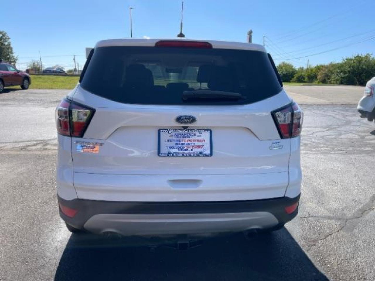 2017 White Platinum Tri-Coat Metallic Ford Escape SE FWD (1FMCU0GD1HU) with an 1.5L L4 DOHC 16V engine, 6-Speed Automatic transmission, located at 4508 South Dixie Dr, Moraine, OH, 45439, (937) 908-9800, 39.689976, -84.218452 - Photo#5