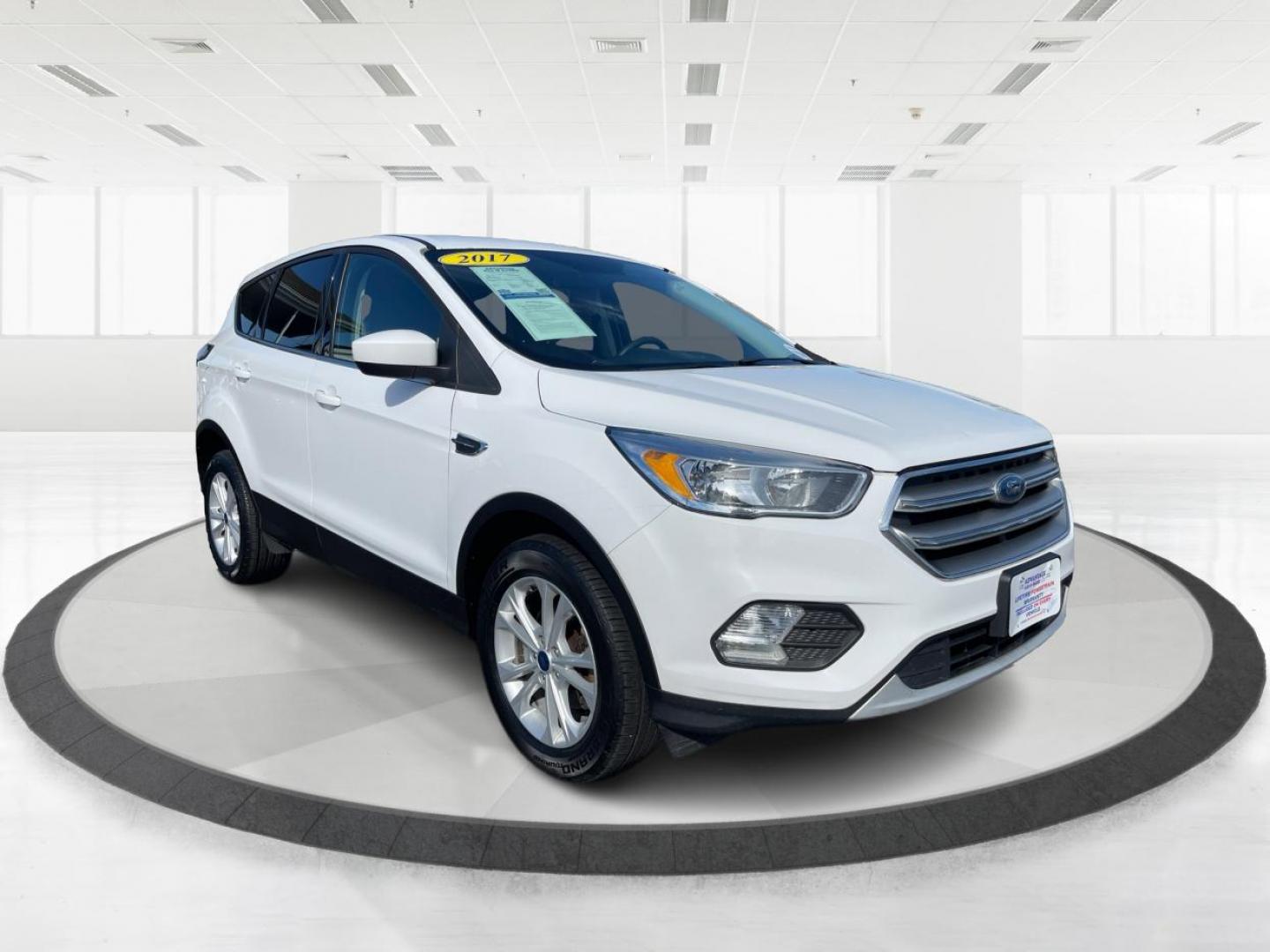 2017 Oxford White Ford Escape (1FMCU9GD1HU) with an 1.5L L4 DOHC 16V engine, 6-Speed Automatic transmission, located at 1184 Kauffman Ave, Fairborn, OH, 45324, (937) 908-9800, 39.807072, -84.030914 - Photo#0