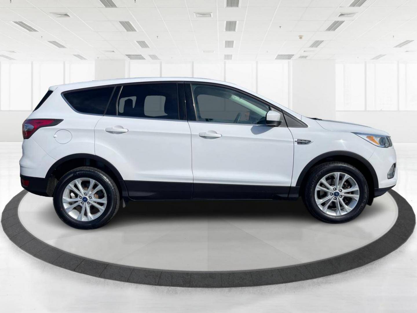 2017 Oxford White Ford Escape (1FMCU9GD1HU) with an 1.5L L4 DOHC 16V engine, 6-Speed Automatic transmission, located at 1184 Kauffman Ave, Fairborn, OH, 45324, (937) 908-9800, 39.807072, -84.030914 - Photo#1