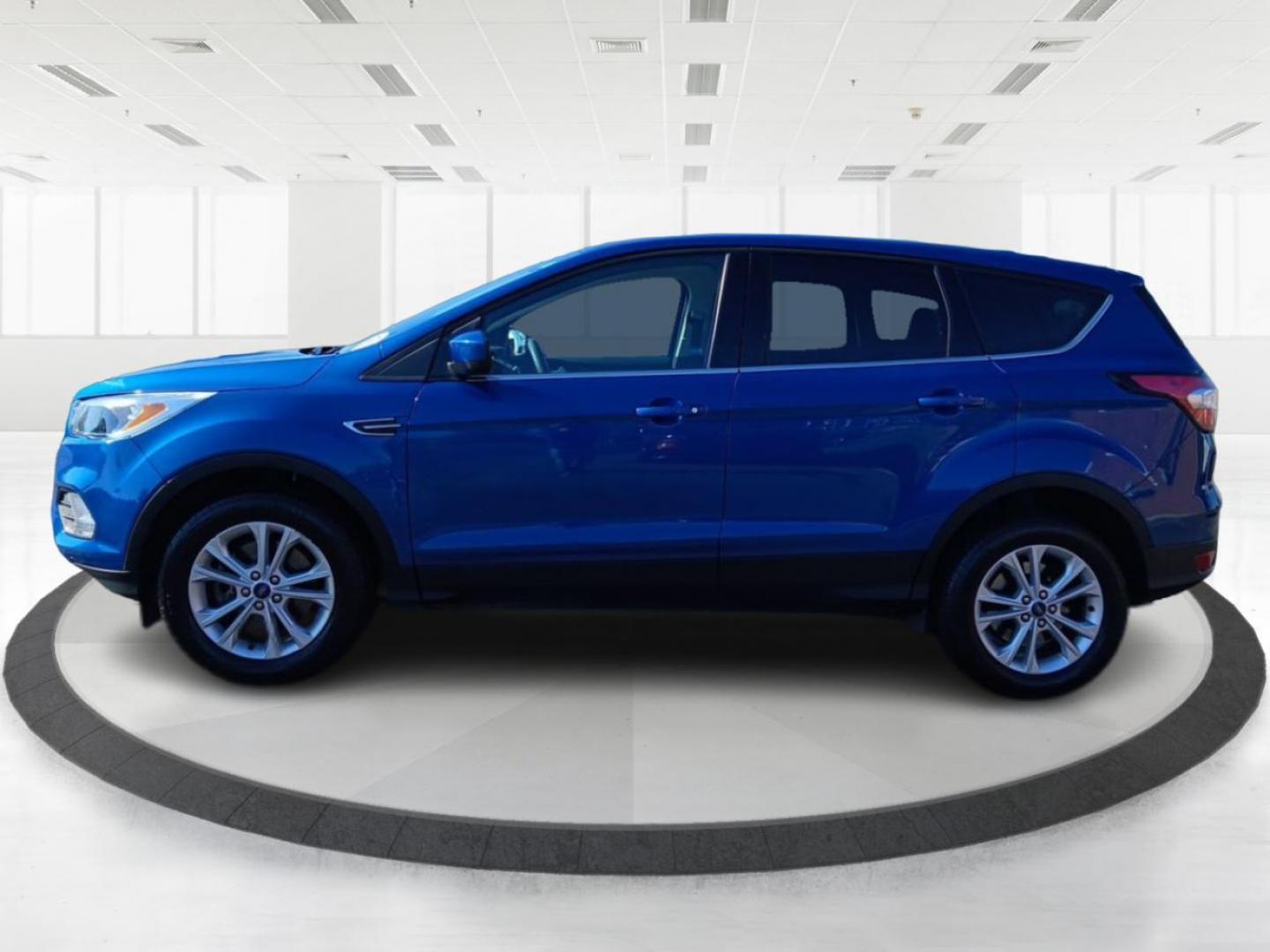 2017 Lightning Blue Metallic Ford Escape SE 4WD (1FMCU9G93HU) with an 2.0L L4 DOHC 16V engine, 6A transmission, located at 1099 N County Rd 25A , Troy, OH, 45373, (937) 908-9800, 40.057079, -84.212883 - Photo#5