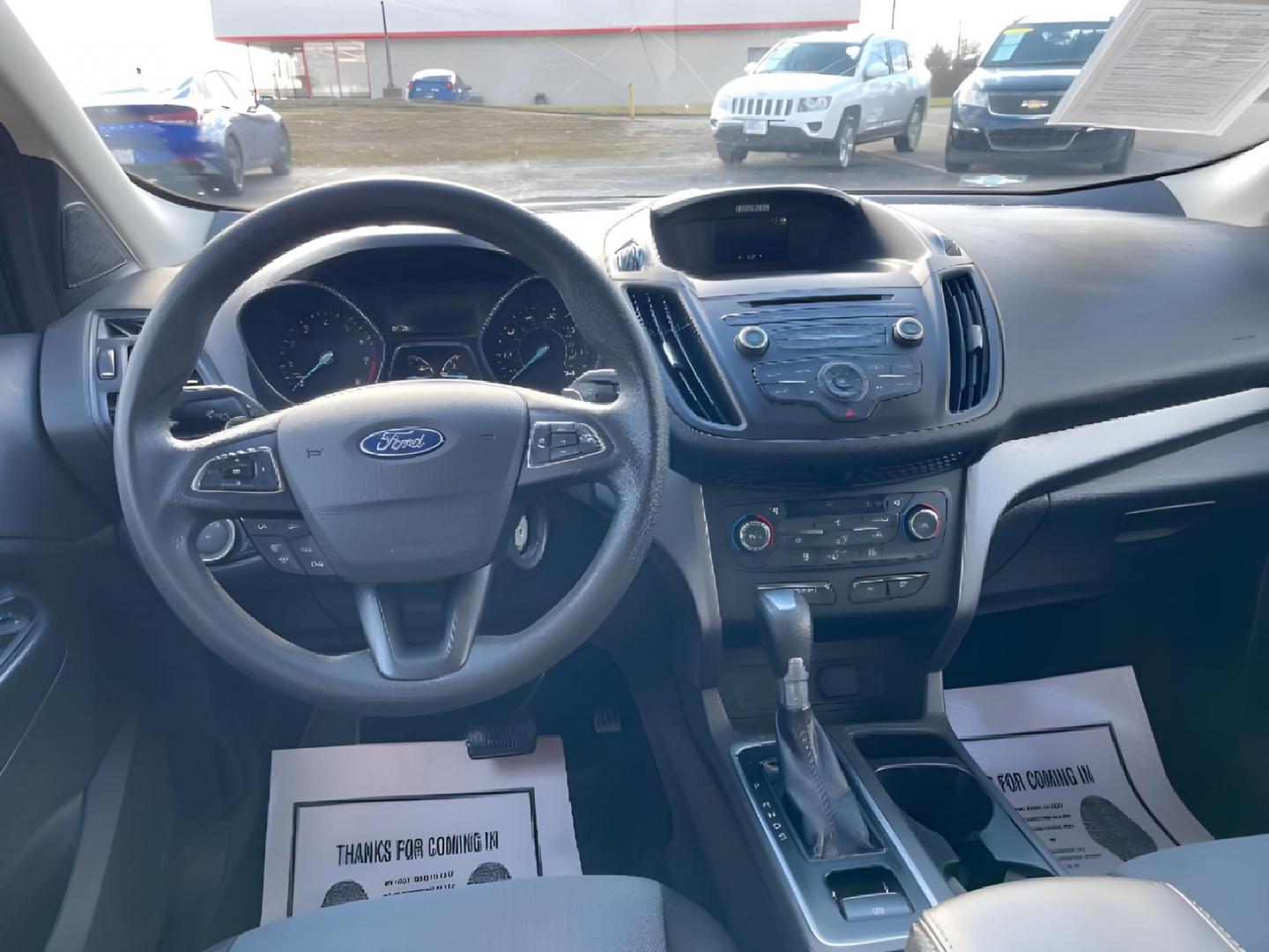 2017 Ruby Red Metallic Tinted Clearcoat Ford Escape (1FMCU9GD4HU) with an 1.5L L4 DOHC 16V engine, 6-Speed Automatic transmission, located at 1230 East Main St, Xenia, OH, 45385, (937) 908-9800, 39.688026, -83.910172 - Photo#8