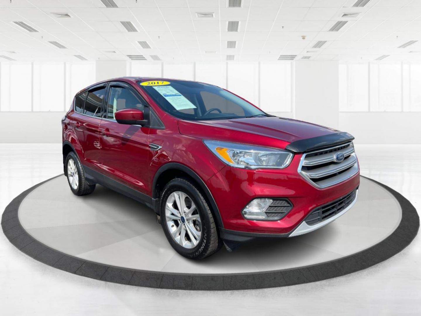 2017 Ruby Red Metallic Tinted Clearcoat Ford Escape (1FMCU9GD0HU) with an 1.5L L4 DOHC 16V engine, 6-Speed Automatic transmission, located at 4508 South Dixie Dr, Moraine, OH, 45439, (937) 908-9800, 39.689976, -84.218452 - Photo#0