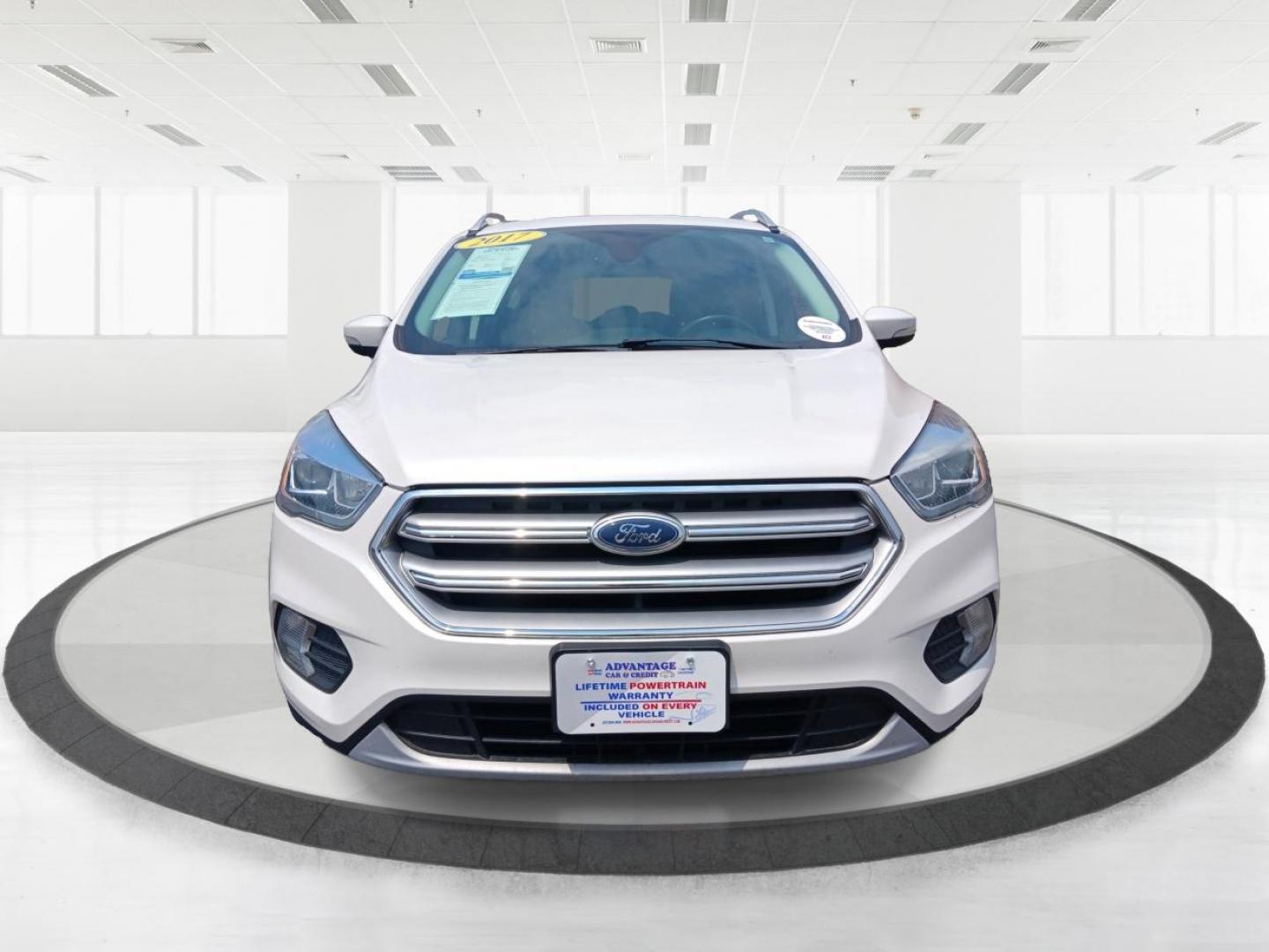 2017 White Gold Metallic Ford Escape (1FMCU9J96HU) with an 2.0L L4 DOHC 16V engine, 6-Speed Automatic transmission, located at 1951 S Dayton Lakeview Rd., New Carlisle, OH, 45344, (937) 908-9800, 39.890999, -84.050255 - Photo#6