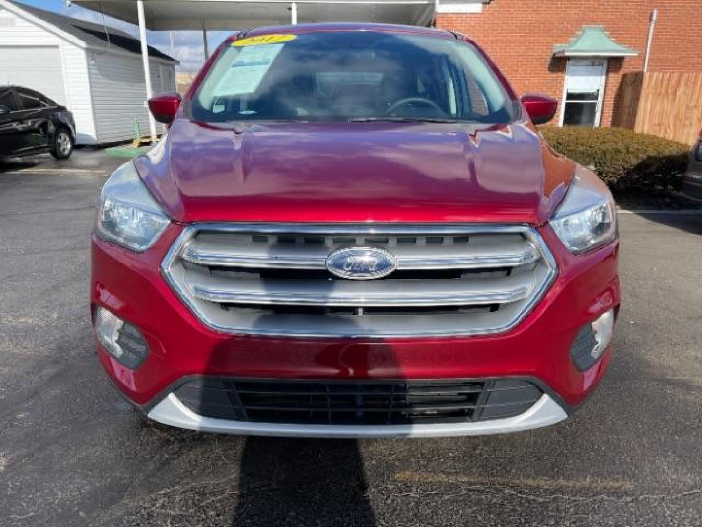 2017 Ruby Red Metallic Tinted Clearcoat Ford Escape SE 4WD (1FMCU9GD4HU) with an 1.5L L4 DOHC 16V engine, 6A transmission, located at 1184 Kauffman Ave, Fairborn, OH, 45324, (937) 908-9800, 39.807072, -84.030914 - Photo#4