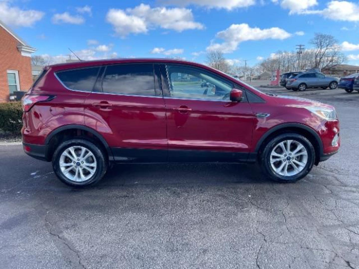 2017 Ruby Red Metallic Tinted Clearcoat Ford Escape SE 4WD (1FMCU9GD4HU) with an 1.5L L4 DOHC 16V engine, 6A transmission, located at 1184 Kauffman Ave, Fairborn, OH, 45324, (937) 908-9800, 39.807072, -84.030914 - Photo#8