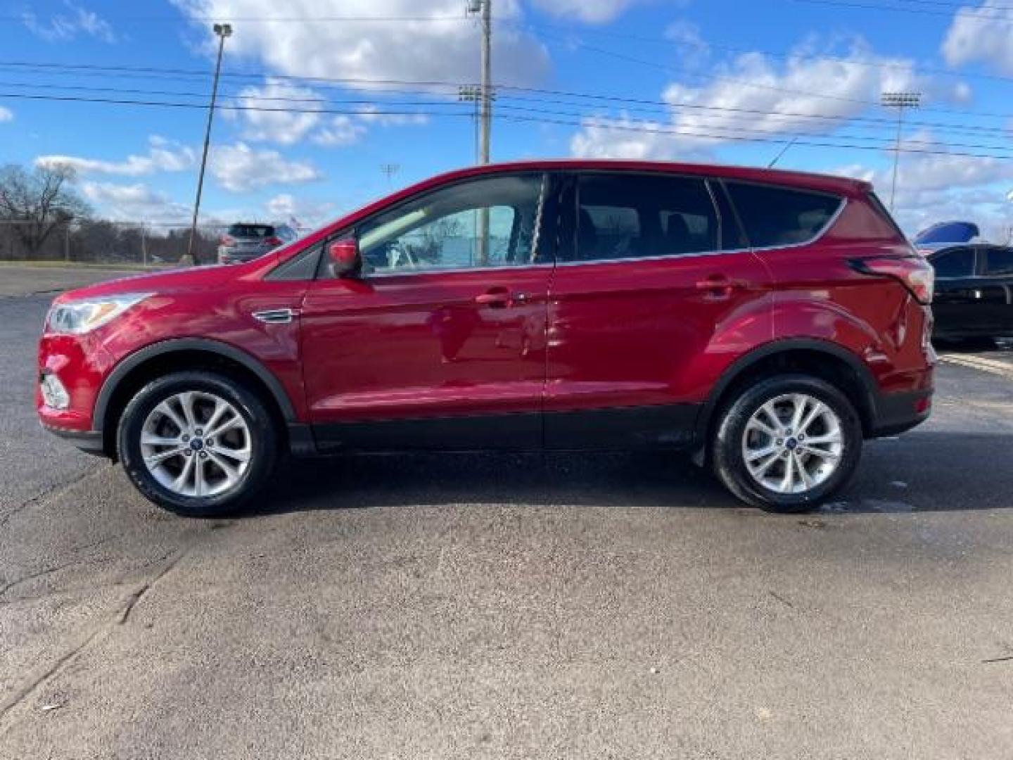 2017 Ruby Red Metallic Tinted Clearcoat Ford Escape SE 4WD (1FMCU9GD4HU) with an 1.5L L4 DOHC 16V engine, 6A transmission, located at 1184 Kauffman Ave, Fairborn, OH, 45324, (937) 908-9800, 39.807072, -84.030914 - Photo#10