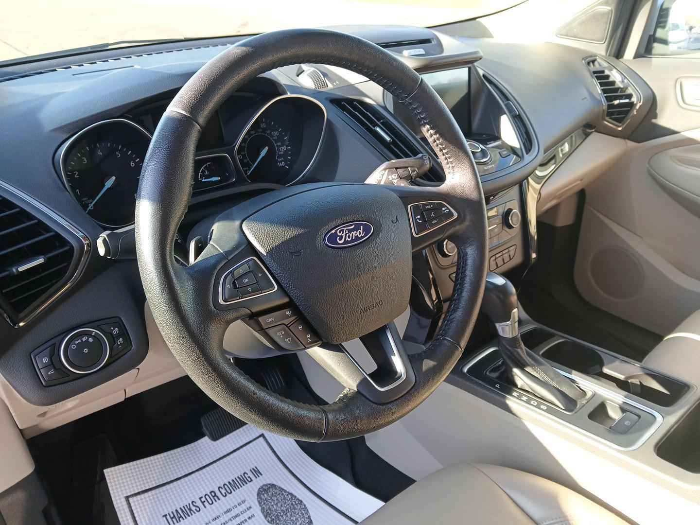 2017 White Gold Metallic Ford Escape Titanium 4WD (1FMCU9J9XHU) with an 2.0L L4 DOHC 16V engine, 6A transmission, located at 401 Woodman Dr, Riverside, OH, 45431, (937) 908-9800, 39.760899, -84.123421 - Photo#8