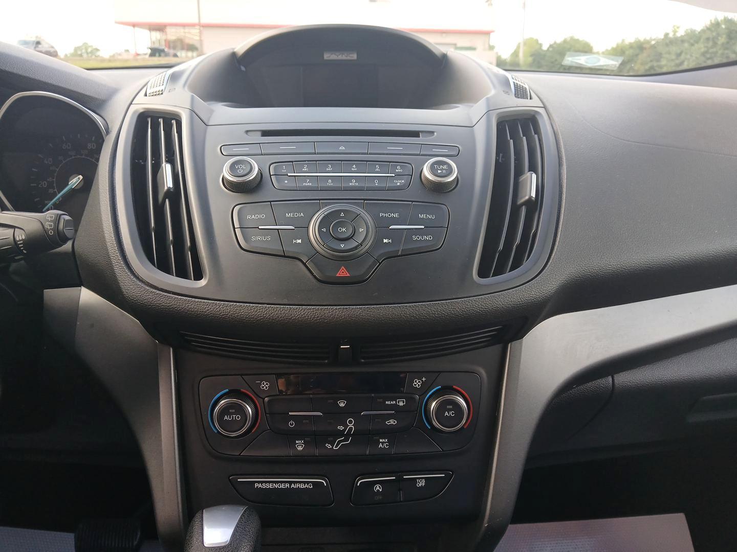 2017 Ruby Red Metallic Tinted Clearcoat Ford Escape (1FMCU9GD0HU) with an 1.5L L4 DOHC 16V engine, 6-Speed Automatic transmission, located at 880 E. National Road, Vandalia, OH, 45377, (937) 908-9800, 39.891918, -84.183594 - Photo#12