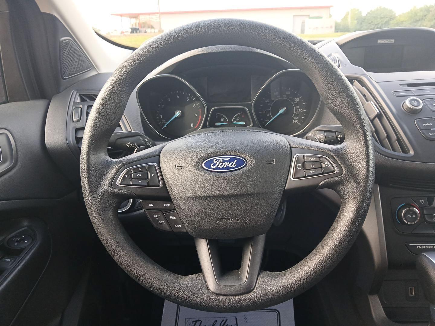 2017 Ruby Red Metallic Tinted Clearcoat Ford Escape (1FMCU9GD0HU) with an 1.5L L4 DOHC 16V engine, 6-Speed Automatic transmission, located at 880 E. National Road, Vandalia, OH, 45377, (937) 908-9800, 39.891918, -84.183594 - Photo#15