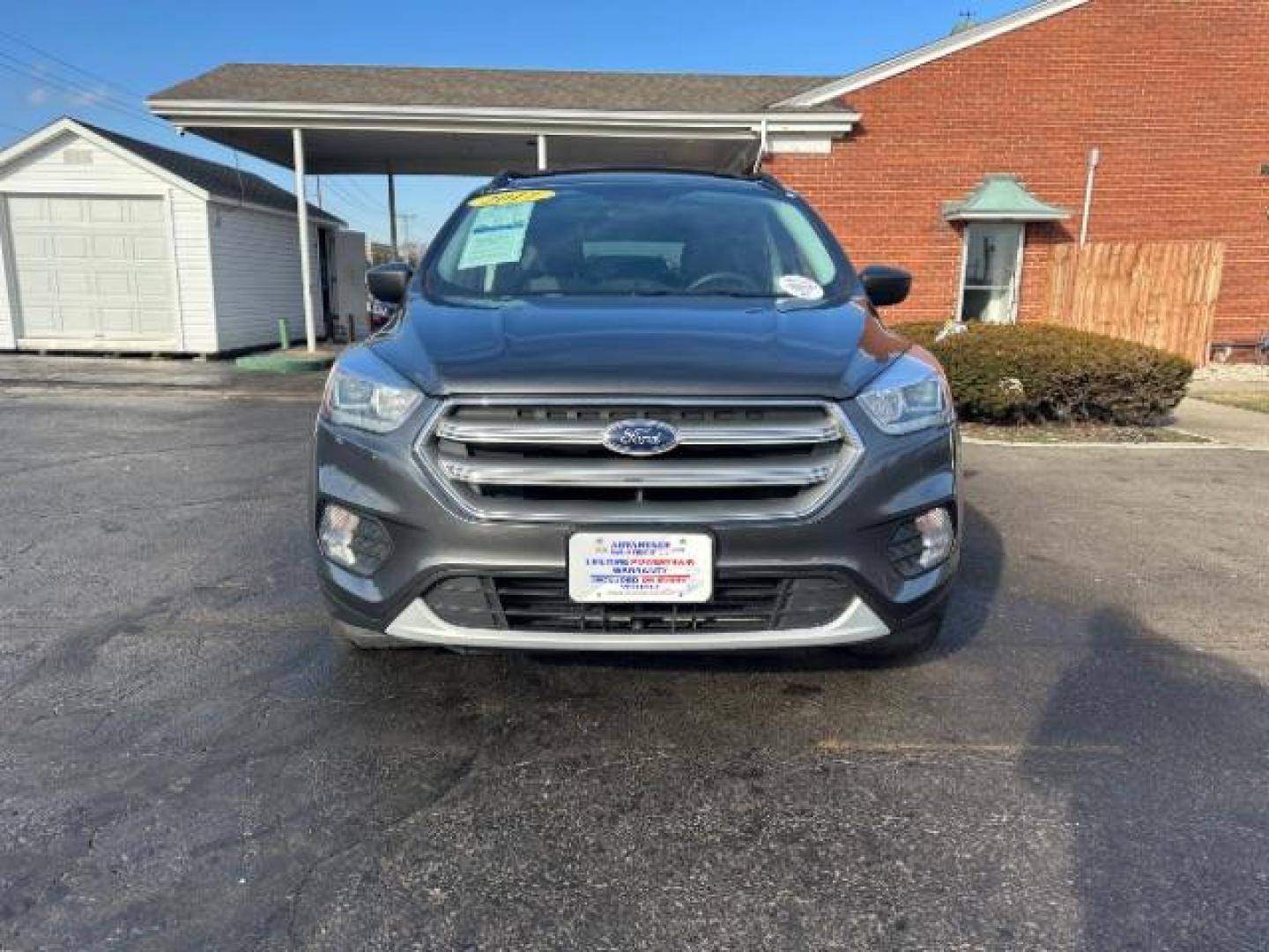 2017 Magnetic Metallic Ford Escape SE 4WD (1FMCU9G91HU) with an 2.0L L4 DOHC 16V engine, 6-Speed Automatic transmission, located at 1951 S Dayton Lakeview Rd., New Carlisle, OH, 45344, (937) 908-9800, 39.890999, -84.050255 - Photo#1