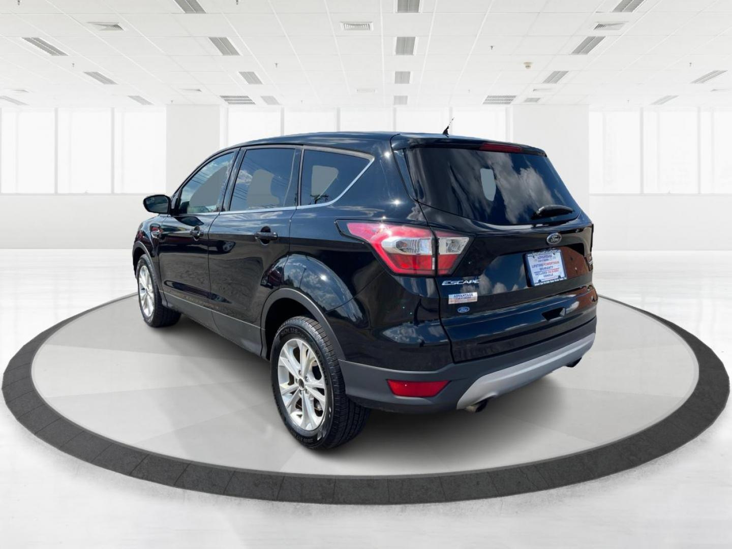 2017 Shadow Black Ford Escape SE FWD (1FMCU0GD6HU) with an 1.5L L4 DOHC 16V engine, 6-Speed Automatic transmission, located at 1230 East Main St, Xenia, OH, 45385, (937) 908-9800, 39.688026, -83.910172 - Photo#4