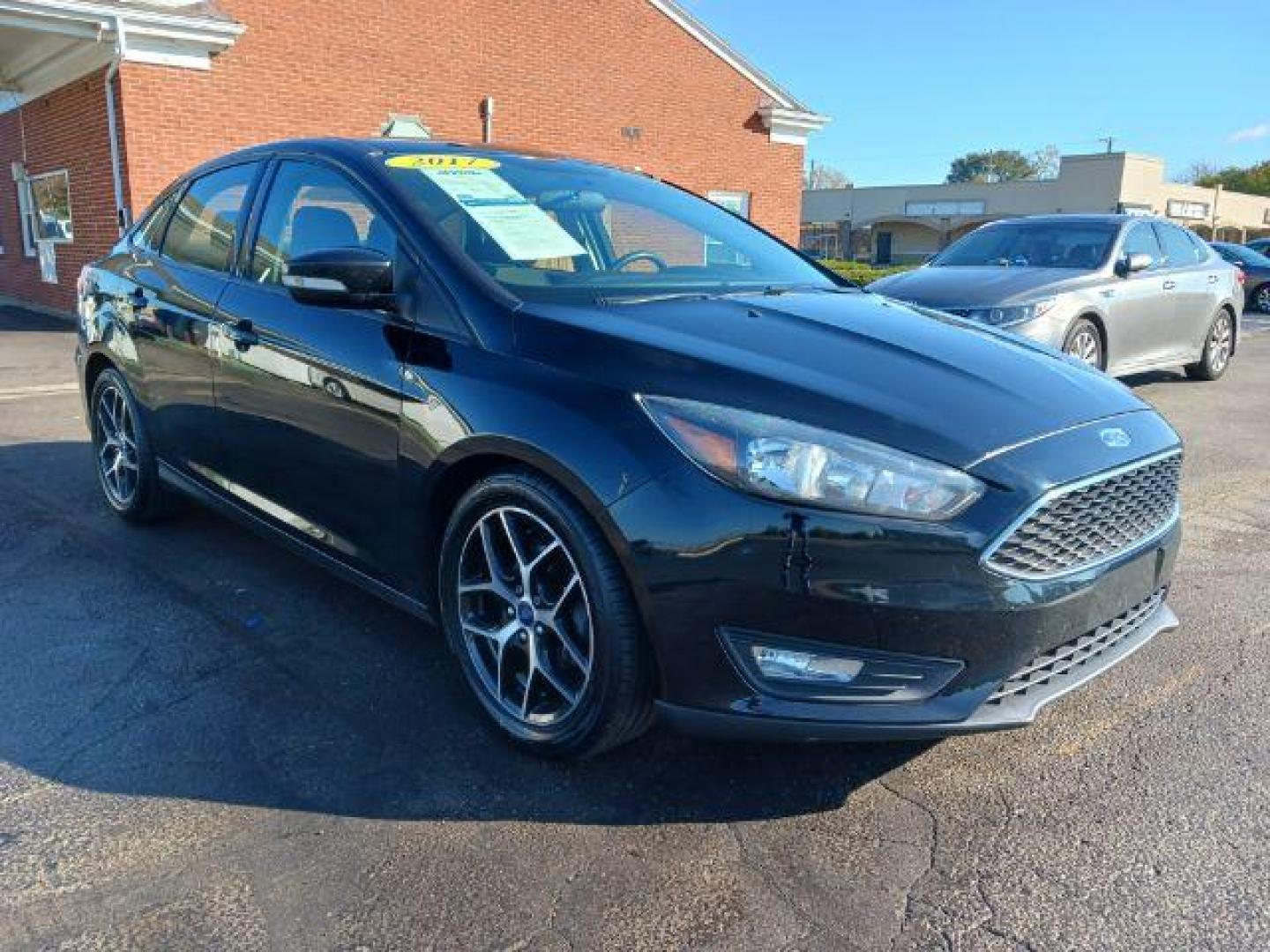 2017 Shadow Black Ford Focus SEL Sedan (1FADP3H2XHL) with an 2.0L L4 DOHC 16V engine, located at 880 E. National Road, Vandalia, OH, 45377, (937) 908-9800, 39.891918, -84.183594 - Photo#0