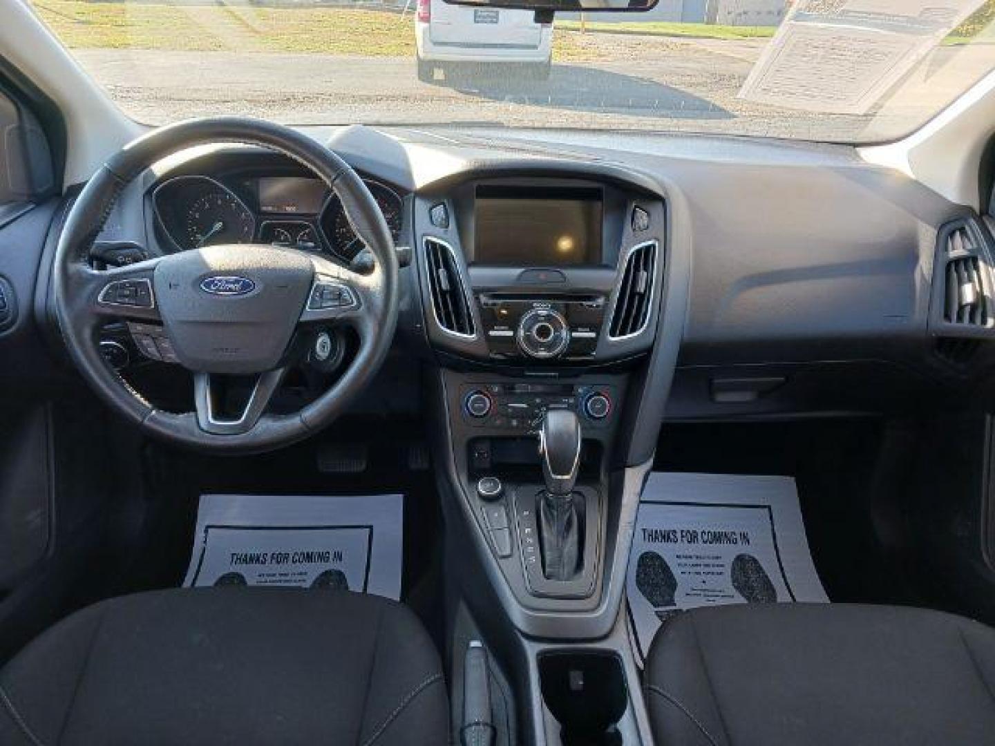 2017 Shadow Black Ford Focus SEL Sedan (1FADP3H2XHL) with an 2.0L L4 DOHC 16V engine, located at 880 E. National Road, Vandalia, OH, 45377, (937) 908-9800, 39.891918, -84.183594 - Photo#7