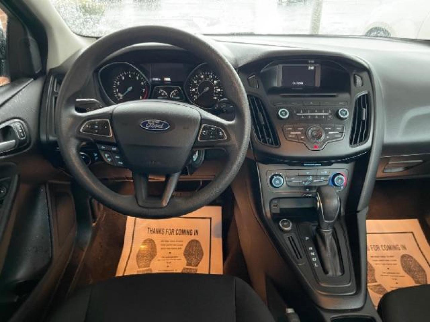 2017 Shadow Black Ford Focus SE Sedan (1FADP3F23HL) with an 2.0L L4 DOHC 16V engine, located at 1099 N County Rd 25A , Troy, OH, 45373, (937) 908-9800, 40.057079, -84.212883 - Photo#8