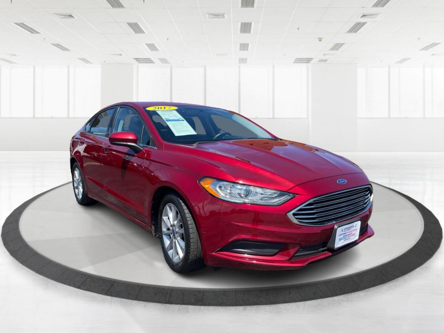 2017 Ruby Red Metallic Tinted Clearcoat Ford Fusion SE (3FA6P0H74HR) with an 2.5L L4 DOHC 16V engine, 6-Speed Automatic transmission, located at 1184 Kauffman Ave, Fairborn, OH, 45324, (937) 908-9800, 39.807072, -84.030914 - Photo#0