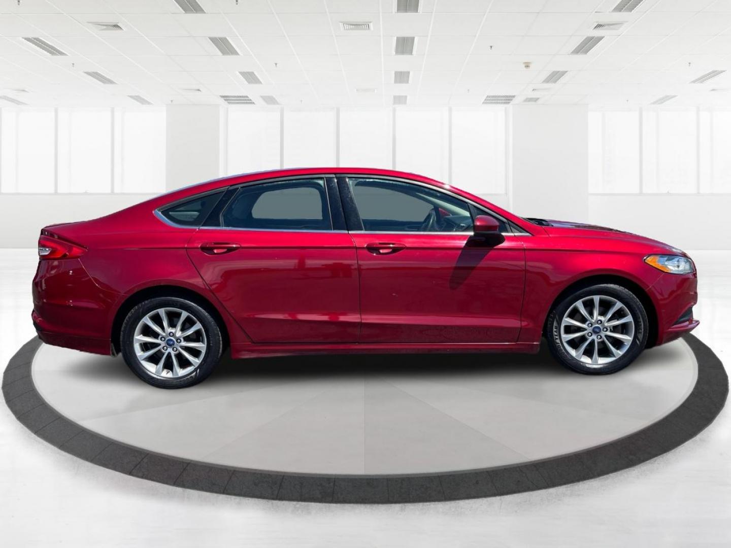 2017 Ruby Red Metallic Tinted Clearcoat Ford Fusion SE (3FA6P0H74HR) with an 2.5L L4 DOHC 16V engine, 6-Speed Automatic transmission, located at 1184 Kauffman Ave, Fairborn, OH, 45324, (937) 908-9800, 39.807072, -84.030914 - Photo#1