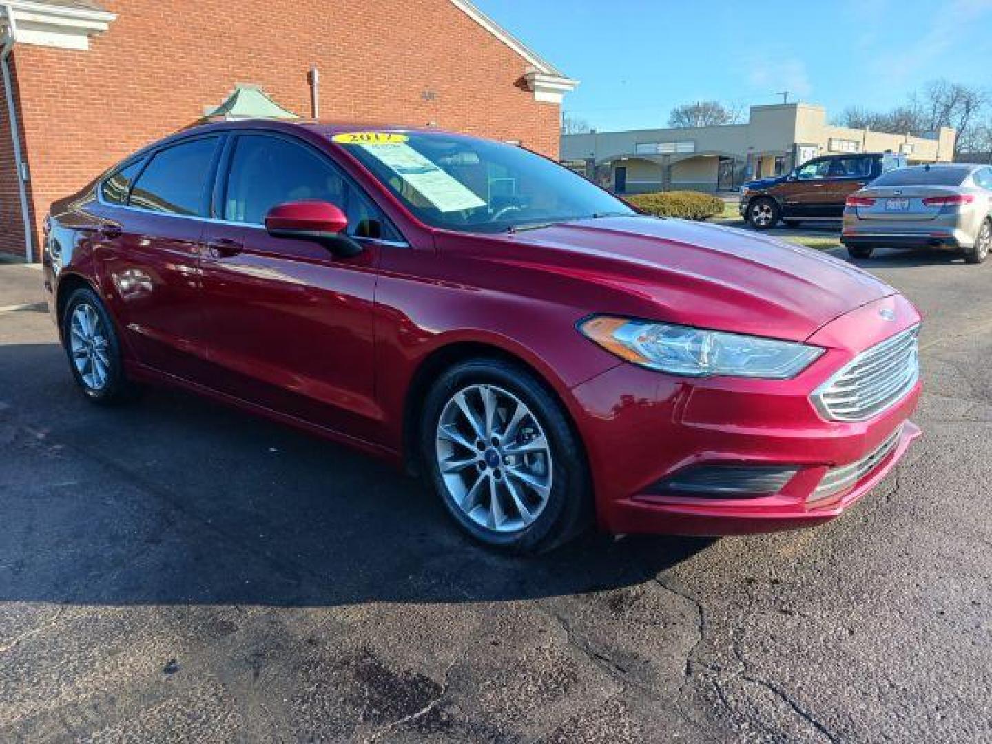 2017 Ruby Red Metallic Tinted Clearcoat Ford Fusion SE (3FA6P0H74HR) with an 2.5L L4 DOHC 16V engine, 6-Speed Automatic transmission, located at 1230 East Main St, Xenia, OH, 45385, (937) 908-9800, 39.688026, -83.910172 - Photo#0