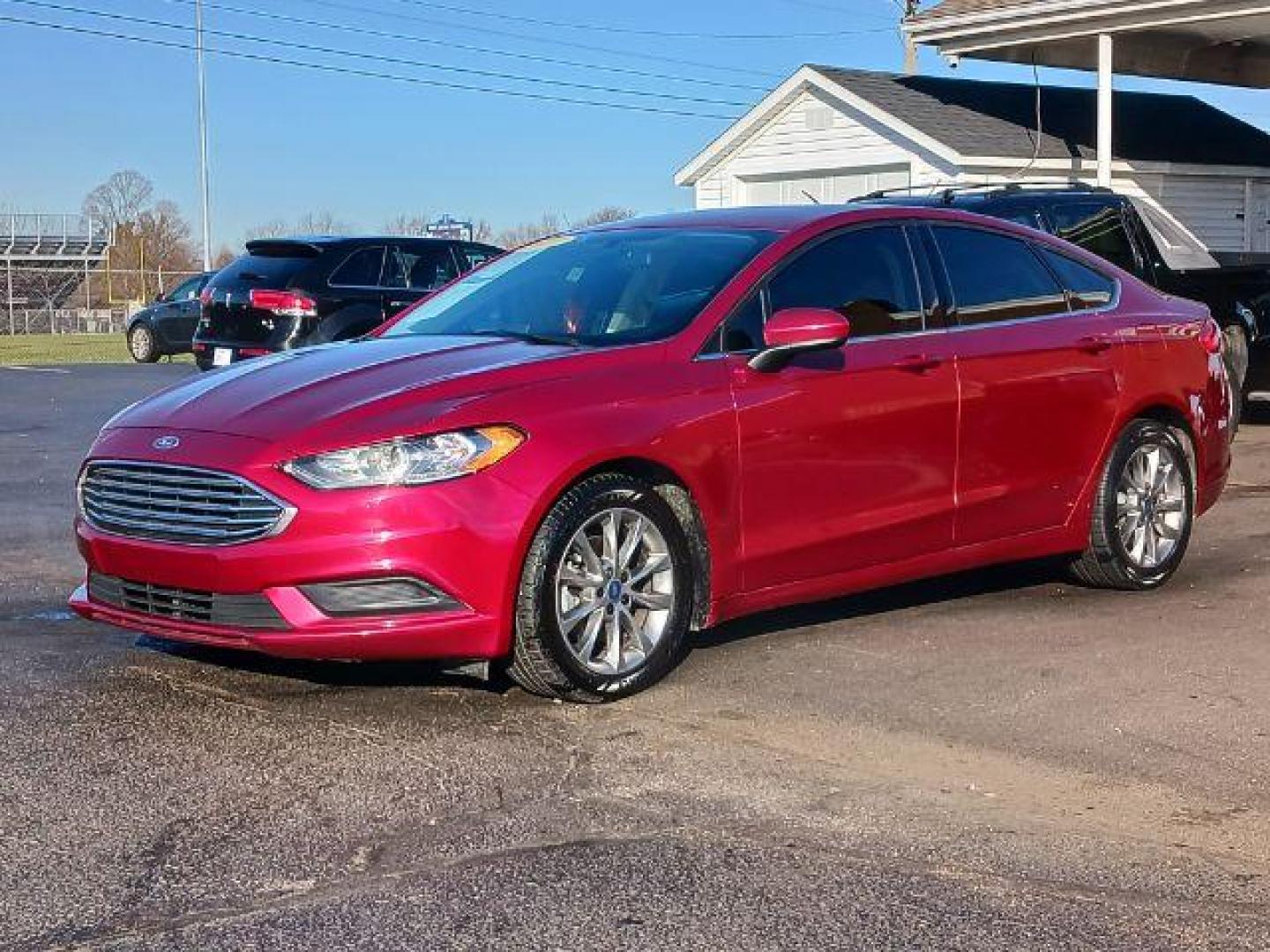 2017 Ruby Red Metallic Tinted Clearcoat Ford Fusion SE (3FA6P0H74HR) with an 2.5L L4 DOHC 16V engine, 6-Speed Automatic transmission, located at 1230 East Main St, Xenia, OH, 45385, (937) 908-9800, 39.688026, -83.910172 - Photo#2