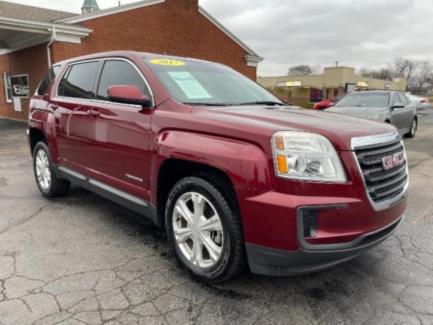 2017 Crimson Red Tintcoat GMC Terrain SLE2 AWD (2GKFLSEKXH6) with an 2.4L L4 DOHC 16V engine, 6-Speed Automatic transmission, located at 1099 N County Rd 25A , Troy, OH, 45373, (937) 908-9800, 40.057079, -84.212883 - Photo#0