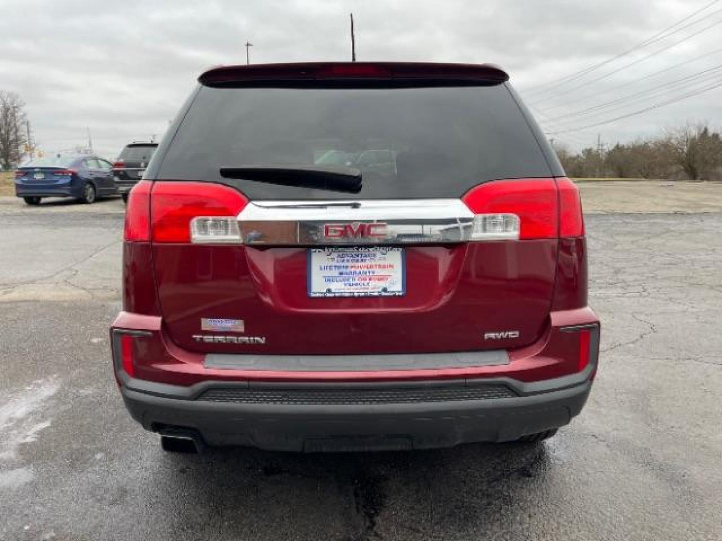 2017 Crimson Red Tintcoat GMC Terrain SLE2 AWD (2GKFLSEKXH6) with an 2.4L L4 DOHC 16V engine, 6-Speed Automatic transmission, located at 1099 N County Rd 25A , Troy, OH, 45373, (937) 908-9800, 40.057079, -84.212883 - Photo#4