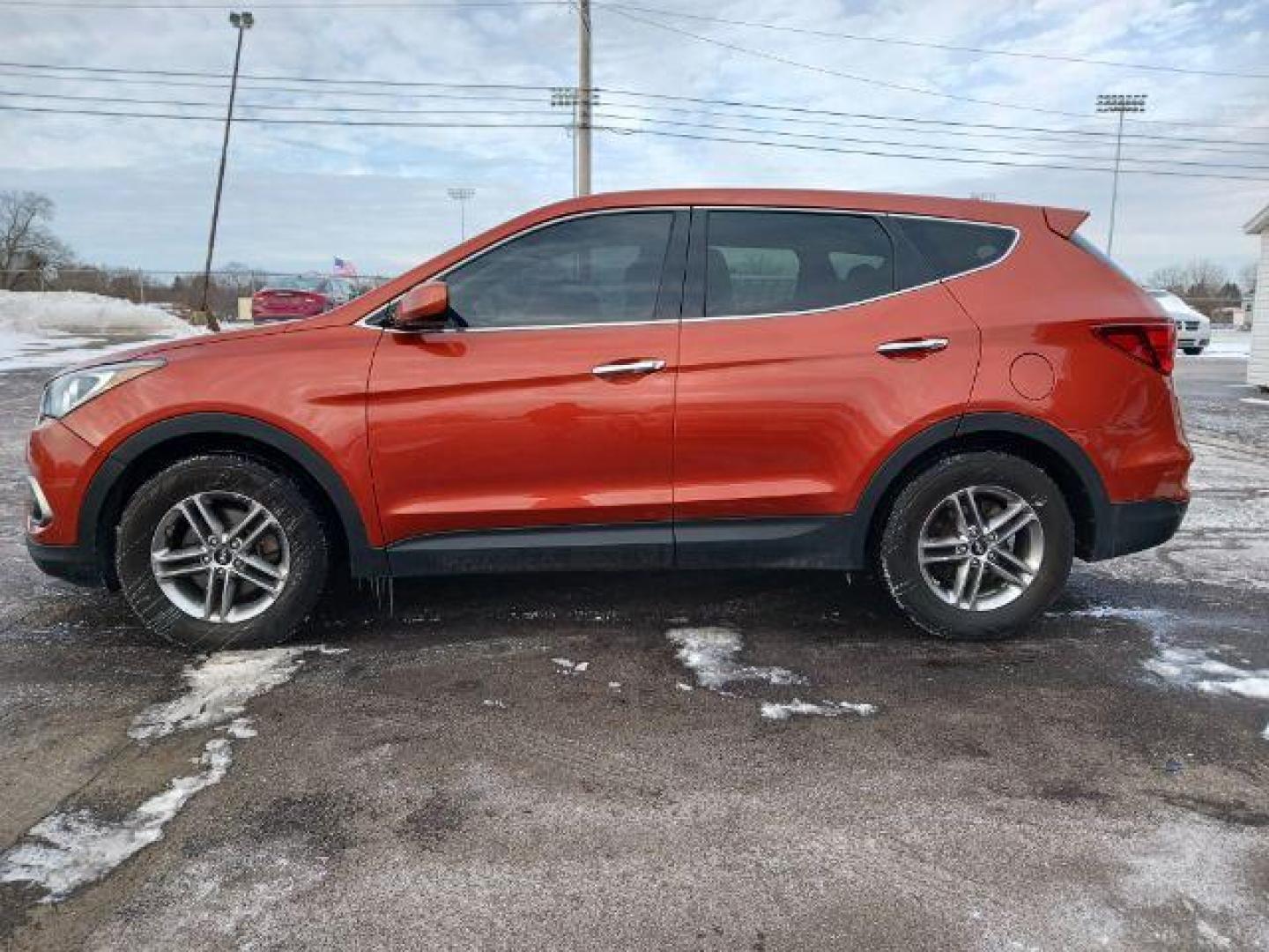 2017 Canyon Copper Hyundai Santa Fe Sport 2.4 AWD (5XYZTDLB2HG) with an 2.4L L4 DOHC 16V engine, 6-Speed Automatic transmission, located at 1184 Kauffman Ave, Fairborn, OH, 45324, (937) 908-9800, 39.807072, -84.030914 - Photo#3