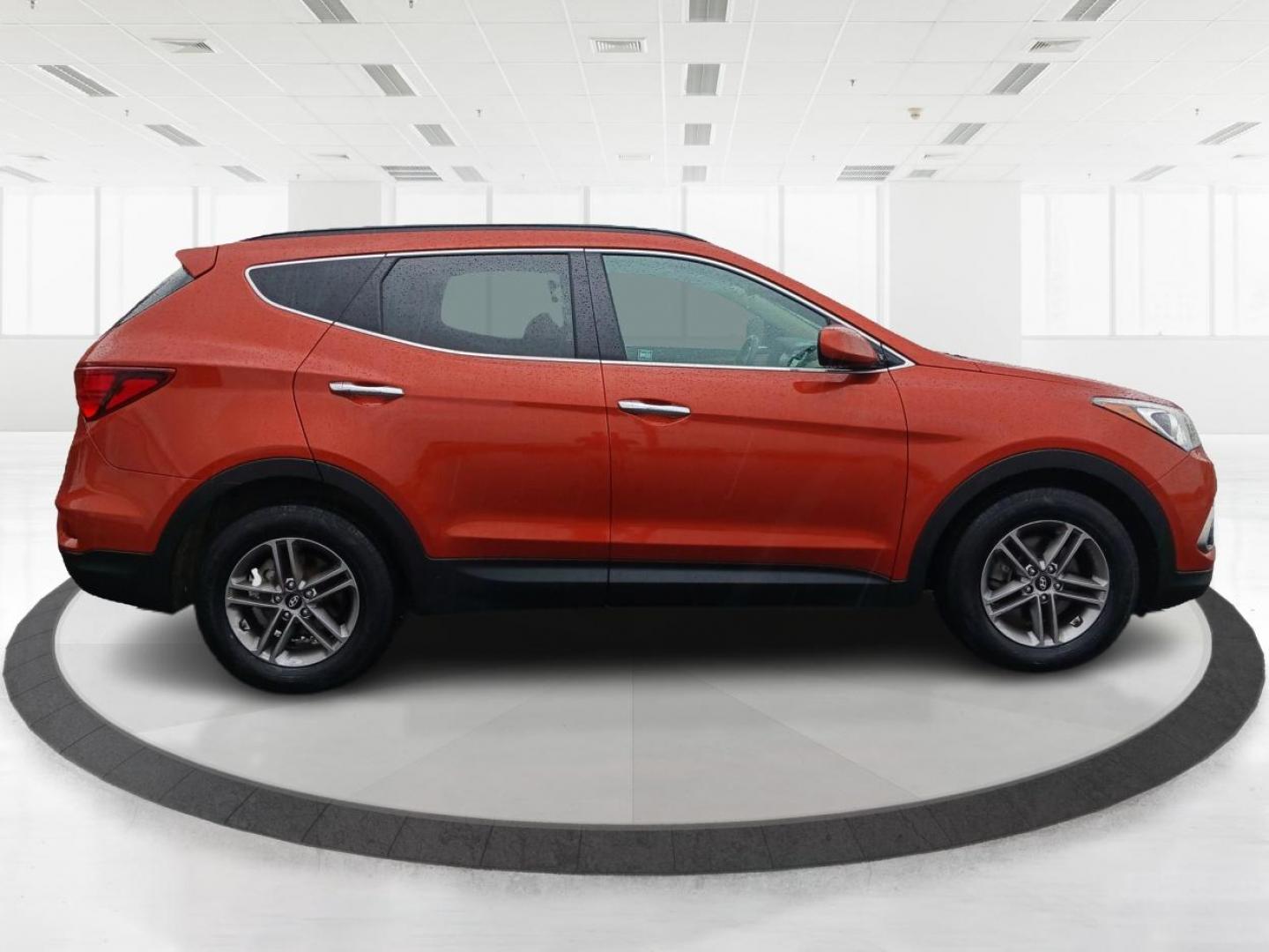 2017 Canyon Copper Hyundai Santa Fe Sport 2.4 AWD (5XYZUDLB3HG) with an 2.4L L4 DOHC 16V engine, 6-Speed Automatic transmission, located at 401 Woodman Dr, Riverside, OH, 45431, (937) 908-9800, 39.760899, -84.123421 - Photo#1