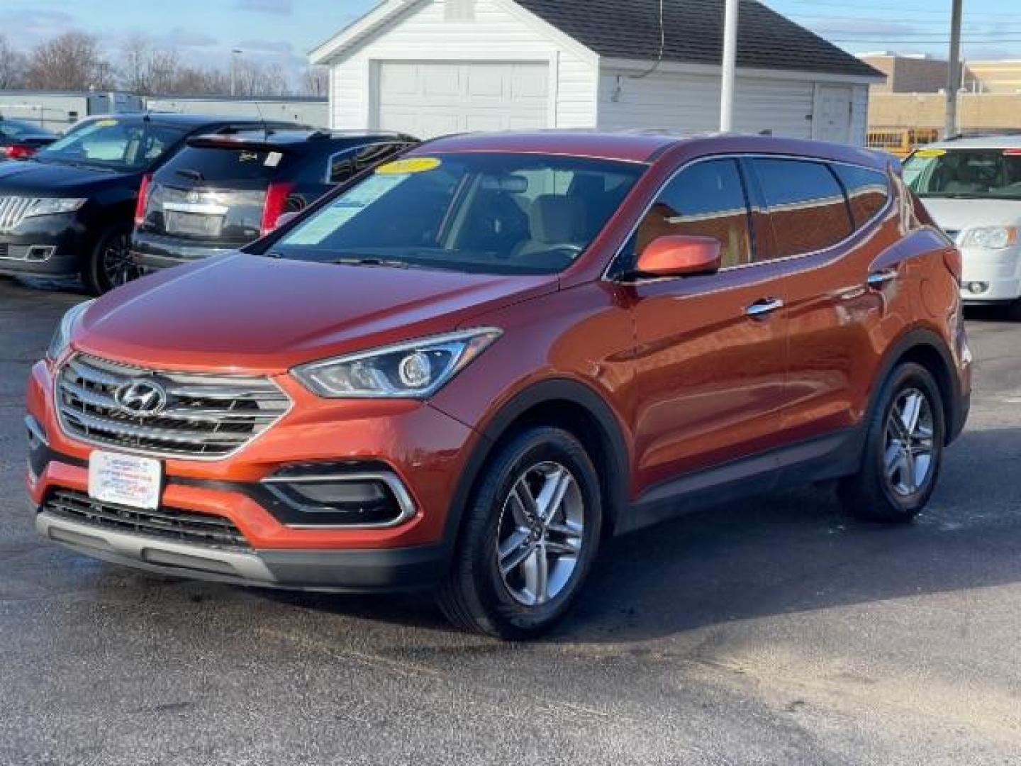 2017 Canyon Copper Hyundai Santa Fe Sport 2.4 FWD (5XYZT3LB8HG) with an 2.4L L4 DOHC 16V engine, 6-Speed Automatic transmission, located at 1230 East Main St, Xenia, OH, 45385, (937) 908-9800, 39.688026, -83.910172 - Photo#1