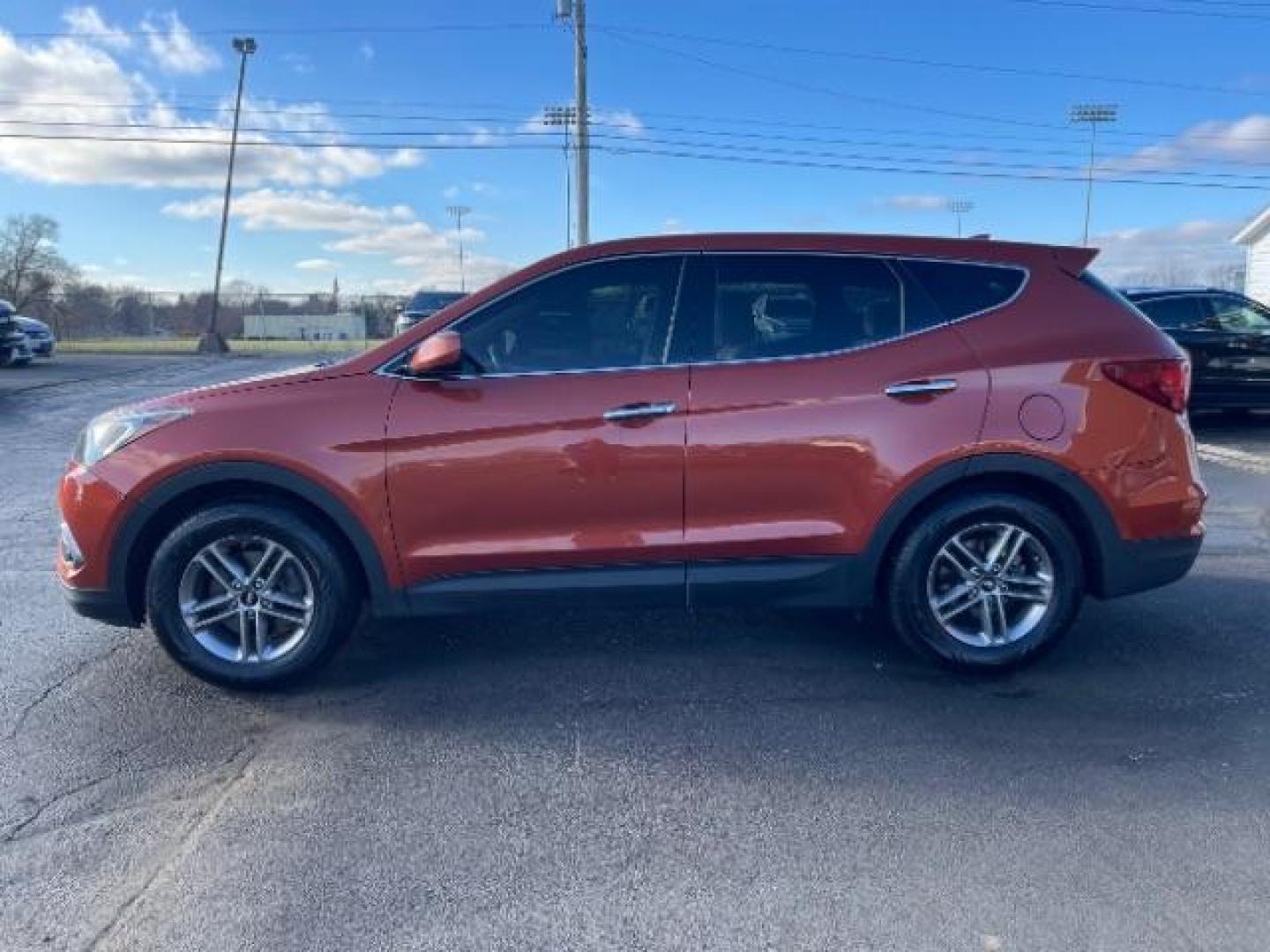 2017 Canyon Copper Hyundai Santa Fe Sport 2.4 FWD (5XYZT3LB8HG) with an 2.4L L4 DOHC 16V engine, 6-Speed Automatic transmission, located at 1230 East Main St, Xenia, OH, 45385, (937) 908-9800, 39.688026, -83.910172 - Photo#2