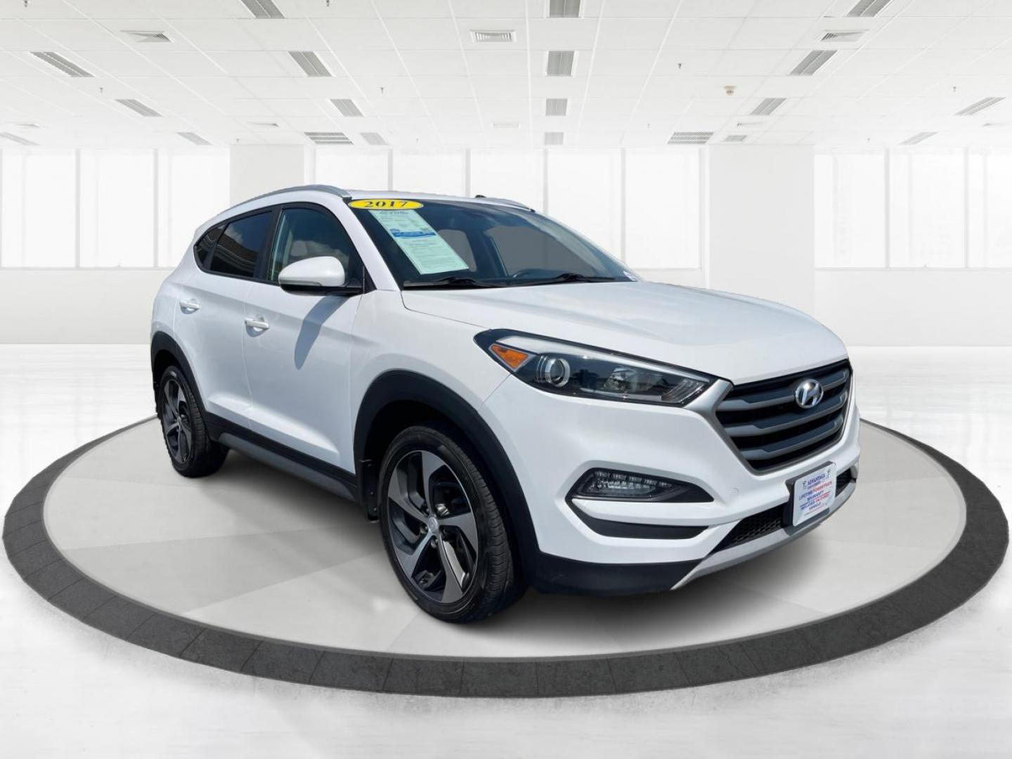 2017 Dazzling White Hyundai Tucson (KM8J3CA22HU) with an 1.6L L4 DOHC 16V engine, 7-Speed Automatic transmission, located at 1099 N County Rd 25A , Troy, OH, 45373, (937) 908-9800, 40.057079, -84.212883 - Photo#0