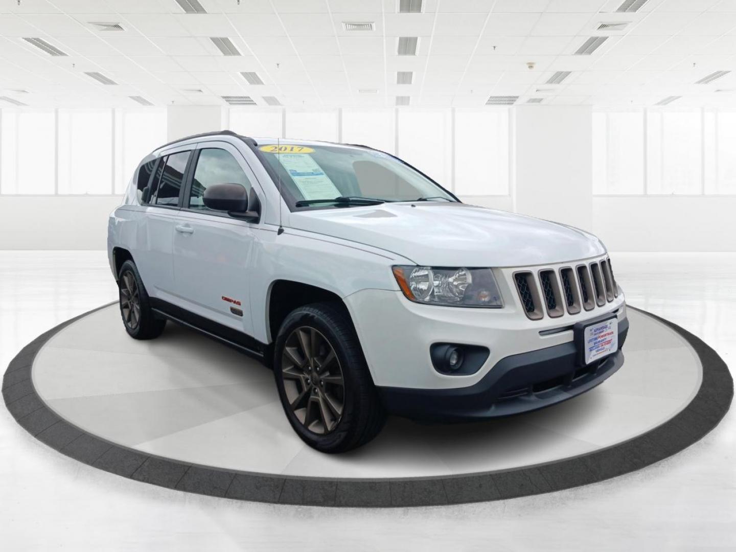 2017 White Knuckle Clear Coat Jeep Compass (1C4NJCBB4HD) with an 2.4L L4 DOHC 16V engine, located at 1184 Kauffman Ave, Fairborn, OH, 45324, (937) 908-9800, 39.807072, -84.030914 - Photo#0