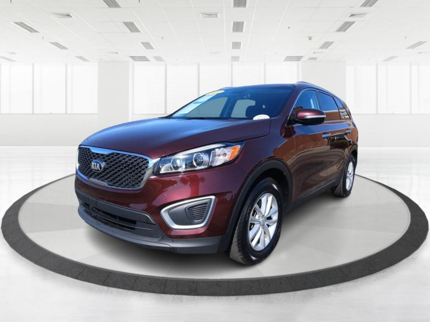 2017 Burgundy Kia Sorento L 2WD (5XYPG4A31HG) with an 2.4L L4 DOHC 16V engine, 6A transmission, located at 401 Woodman Dr, Riverside, OH, 45431, (937) 908-9800, 39.760899, -84.123421 - Photo#7