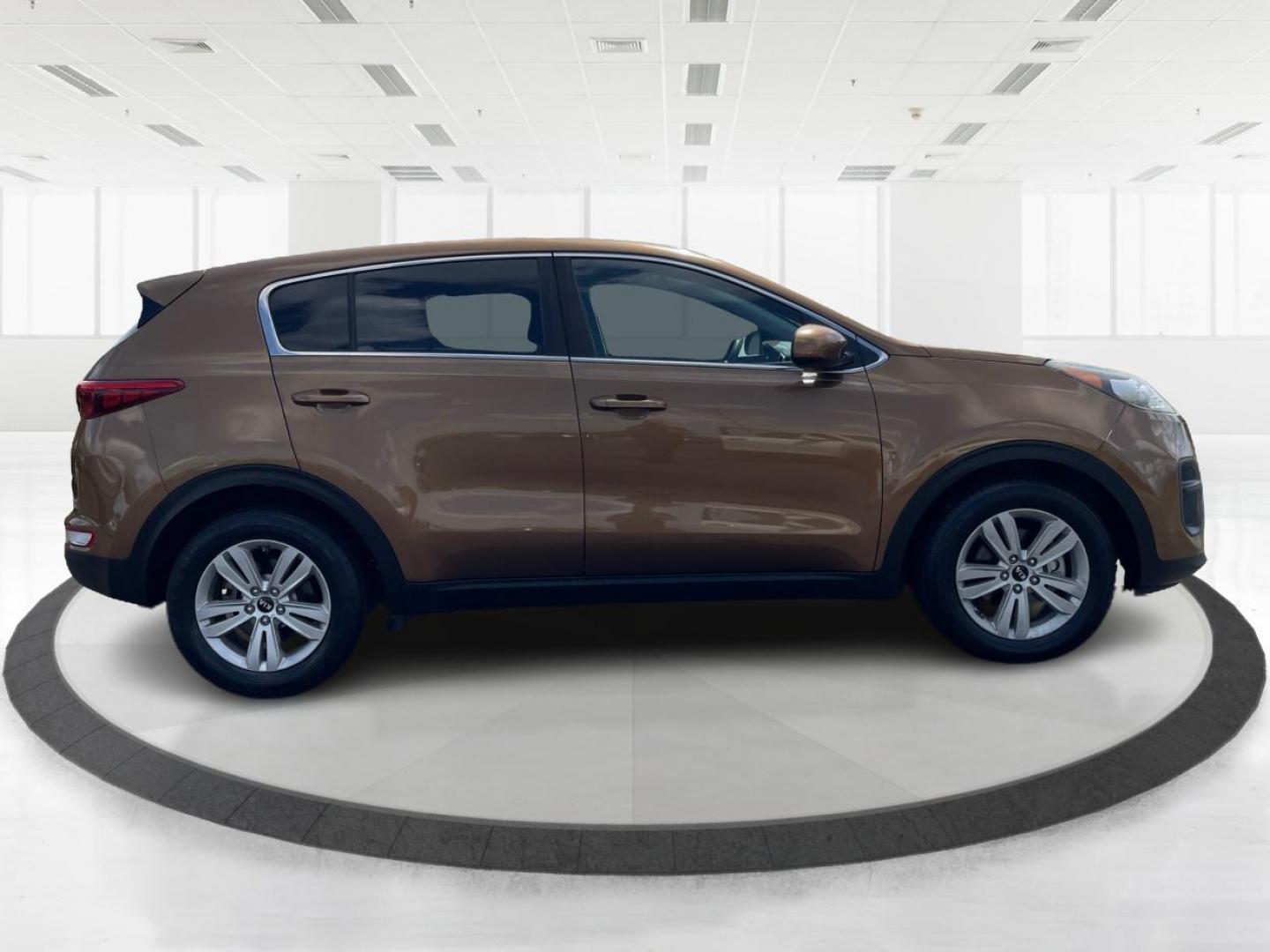 2017 Burnished Copper Kia Sportage LX FWD (KNDPM3AC2H7) with an 2.4L V6 DOHC 24V engine, 6-Speed Automatic transmission, located at 1951 S Dayton Lakeview Rd., New Carlisle, OH, 45344, (937) 908-9800, 39.890999, -84.050255 - Photo#1