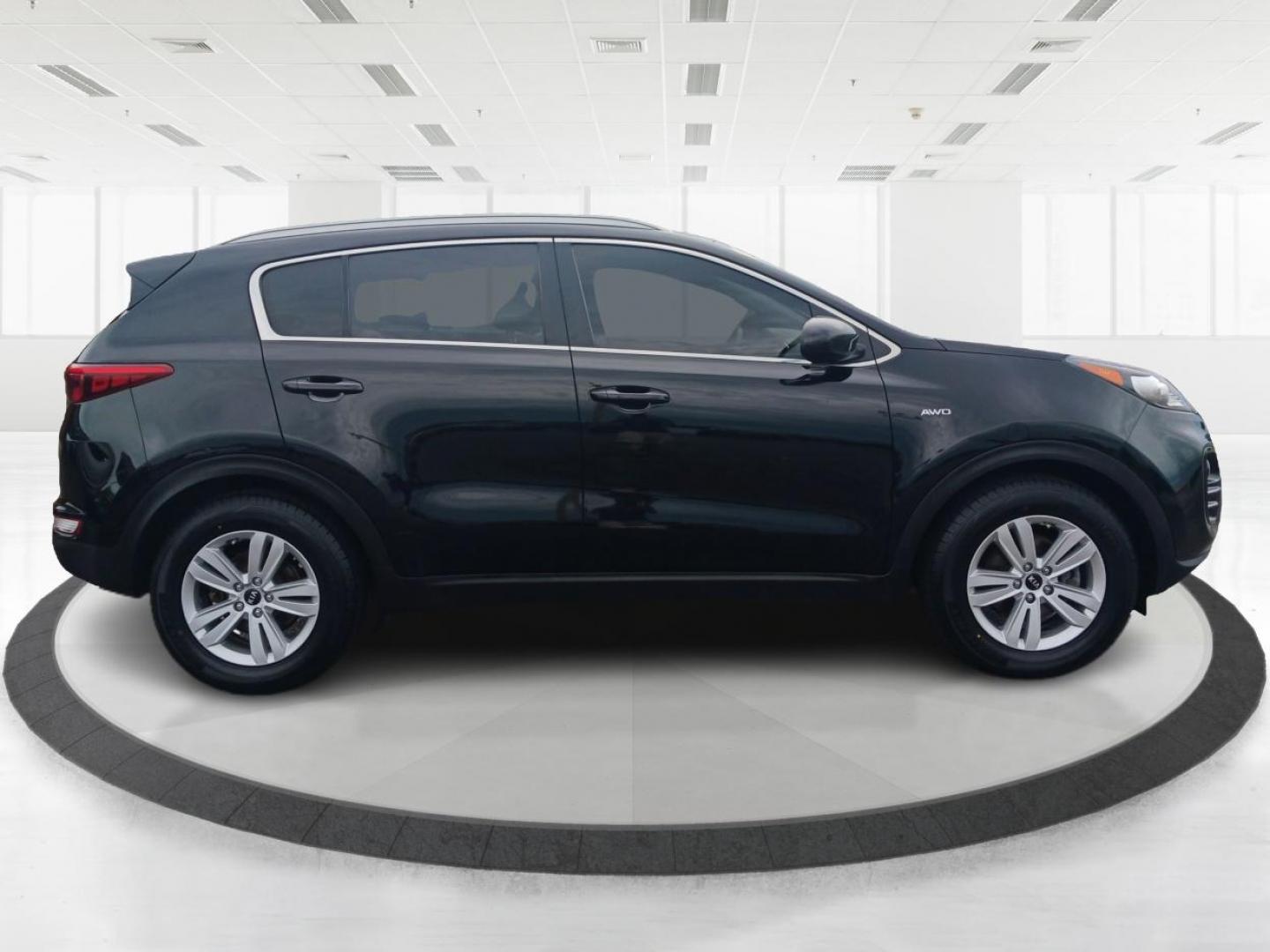 2017 Black Cherry Kia Sportage (KNDPMCAC8H7) with an 2.4L V6 DOHC 24V engine, 6-Speed Automatic transmission, located at 1951 S Dayton Lakeview Rd., New Carlisle, OH, 45344, (937) 908-9800, 39.890999, -84.050255 - Photo#1