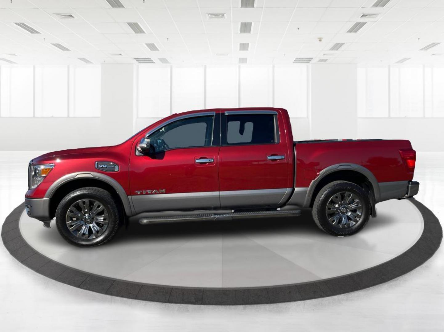 2017 Nissan Titan Platinum Reserve Crew Cab 4WD (1N6AA1E53HN) with an 5.6L V8 DOHC 32V engine, 6-Speed Automatic transmission, located at 1184 Kauffman Ave, Fairborn, OH, 45324, (937) 908-9800, 39.807072, -84.030914 - 2017 Nissan Titan Platinum Reserve Crew Cab 4WD - Photo#5