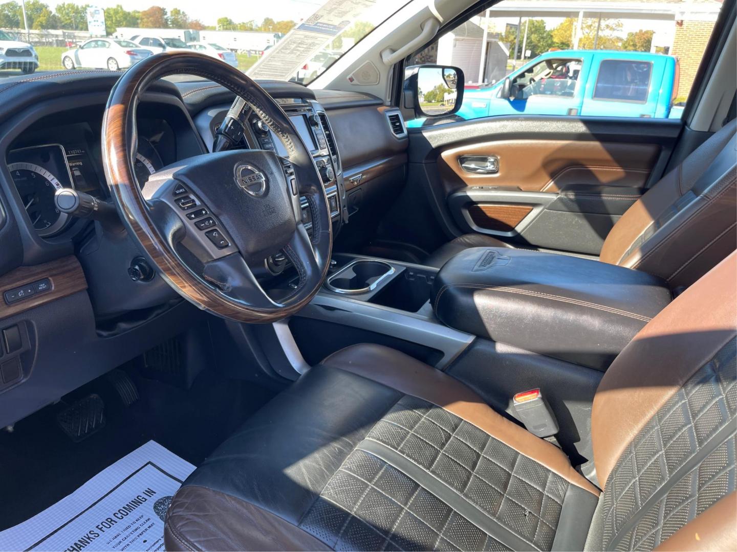 2017 Nissan Titan Platinum Reserve Crew Cab 4WD (1N6AA1E53HN) with an 5.6L V8 DOHC 32V engine, 6-Speed Automatic transmission, located at 1184 Kauffman Ave, Fairborn, OH, 45324, (937) 908-9800, 39.807072, -84.030914 - 2017 Nissan Titan Platinum Reserve Crew Cab 4WD - Photo#8